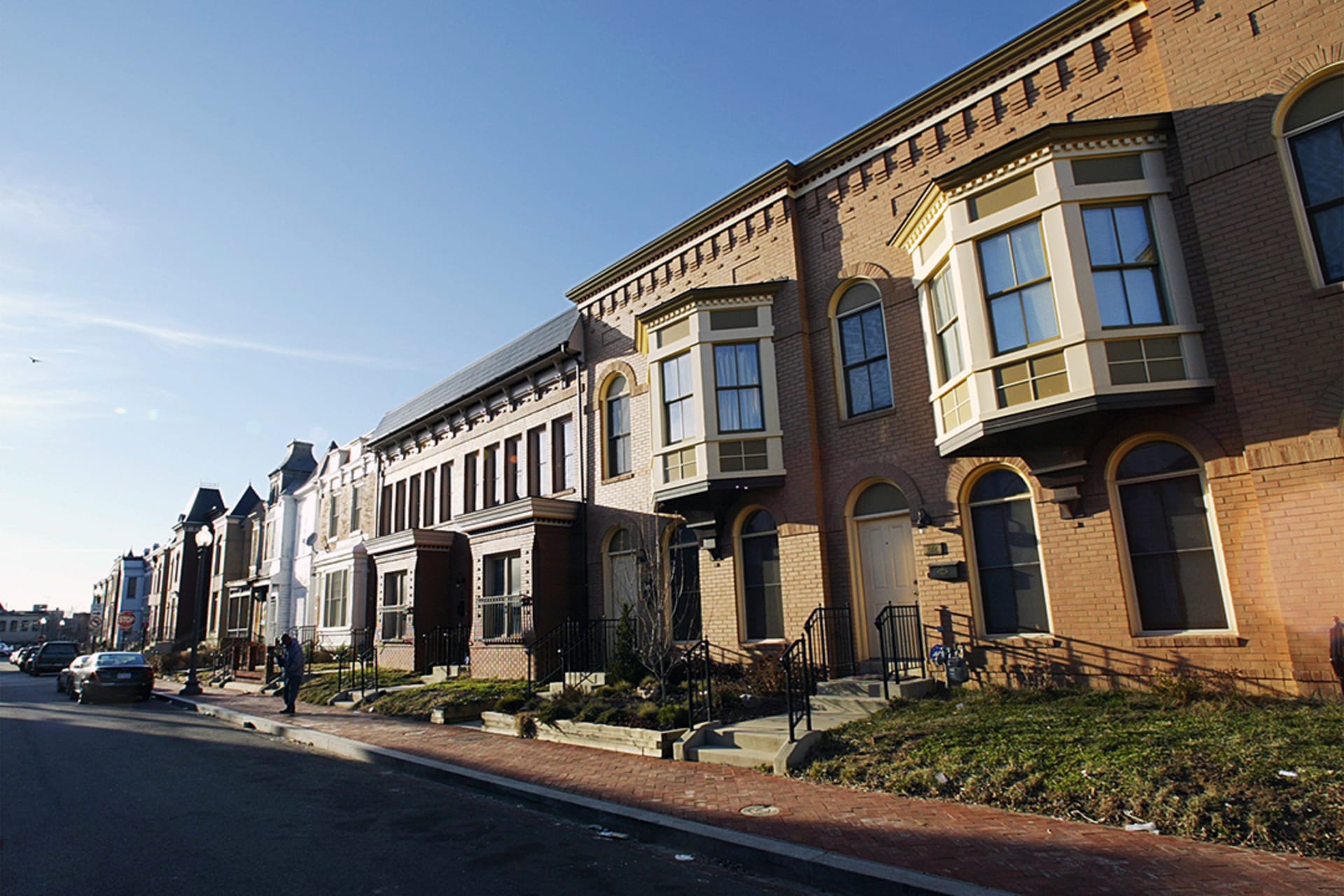 Newly-built and remodeled houses line U Street in northwest Washington, DC. 
