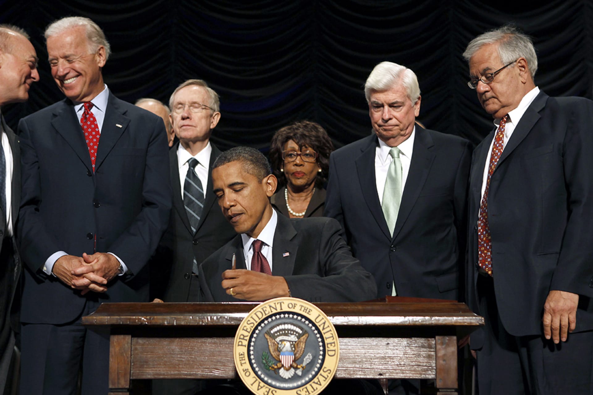 President Obama signs the Dodd-Frank Wall Street Reform and Consumer Protection Act into law in Washington, DC. 
