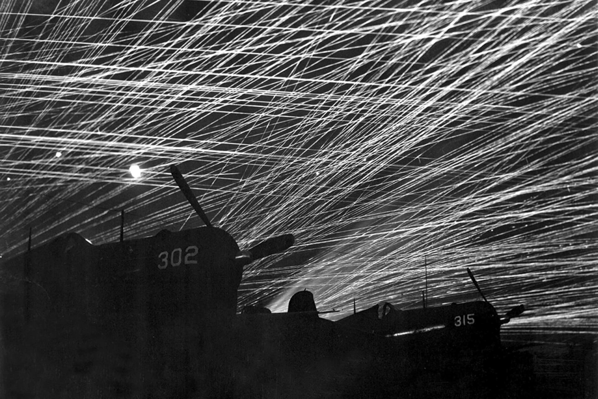 Antiaircraft fire above U.S. Marine Corps Corsair fighters on Okinawa.