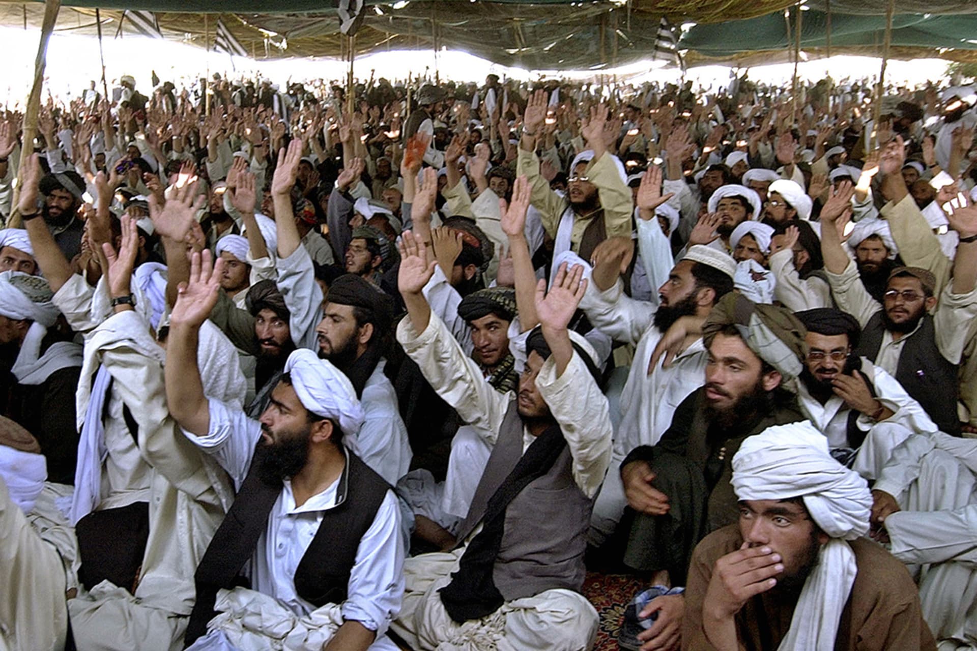 Pro-Taliban supporters during a rally in Killi Nalai village, Pakistan, near the Afghan border, 2007. 
