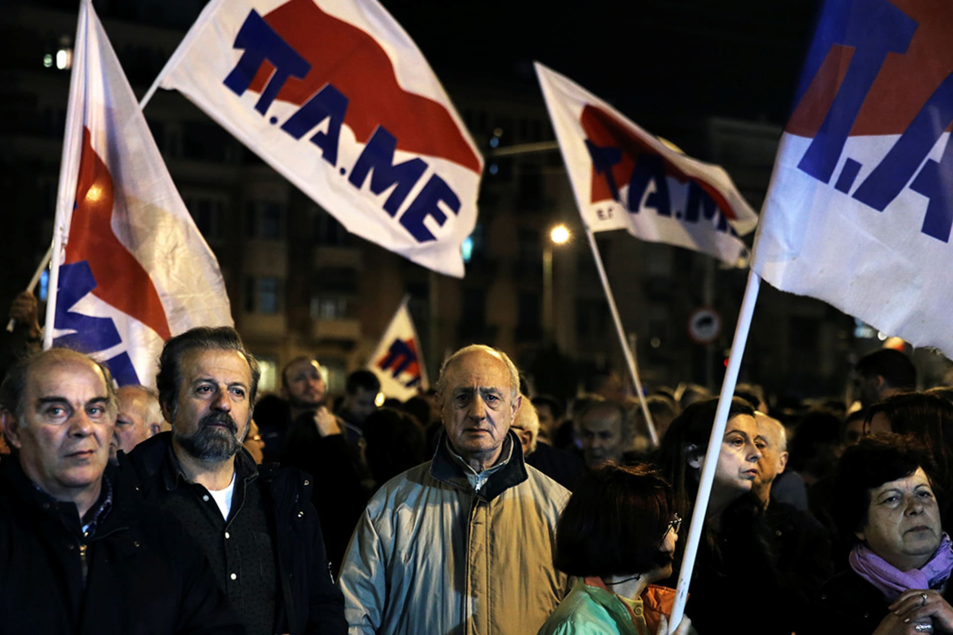 Trade unionists demonstrate in opposition to the EU’s mandated budget cuts and labor reforms in Athens. 