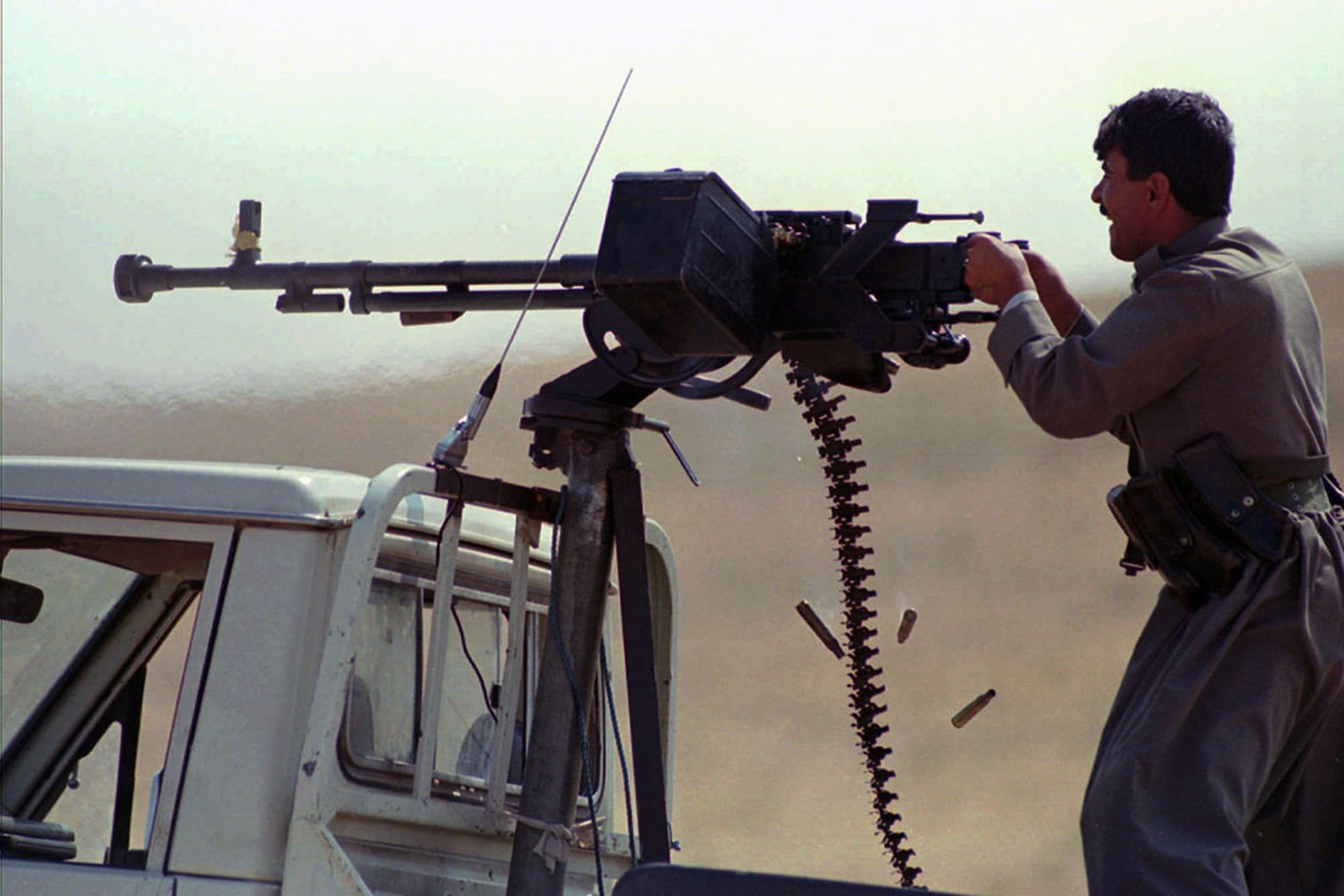 A KDP fighter fires on PUK-held positions southeast of Erbil on September 5, 1996. 

