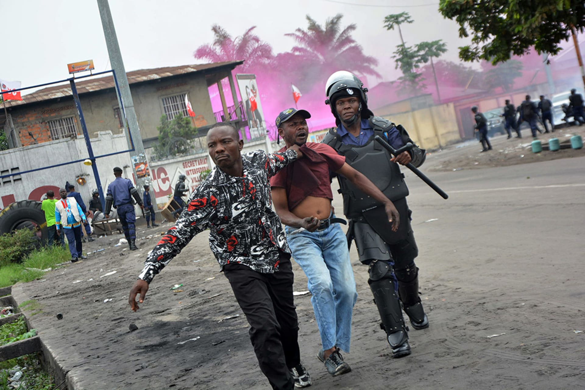 Security forces in Kinshasa arrest a demonstrator during protests against a new electoral law in January 2015. Papy Mulongo/AFP/Getty Images