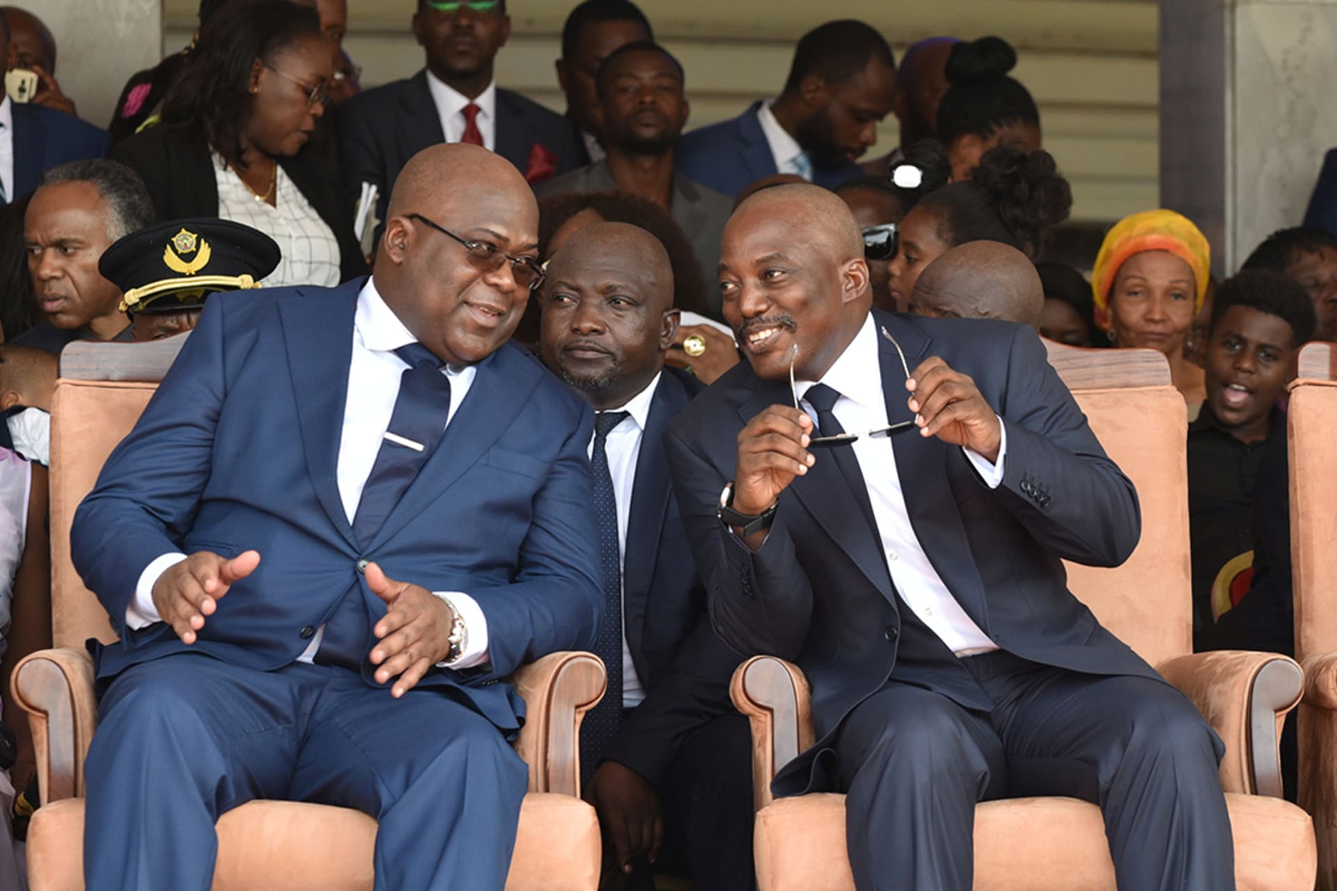 Félix Tshisekedi sits next to Kabila at his inauguration ceremony on January 24, 2019. Olivia Acland/Reuters
