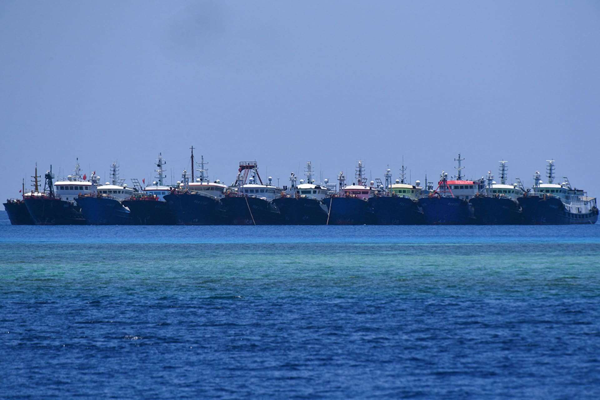 Chinese vessels are moored at Whitsun Reef in the Spratly Islands. Ted Aljibe AFP/Getty Images