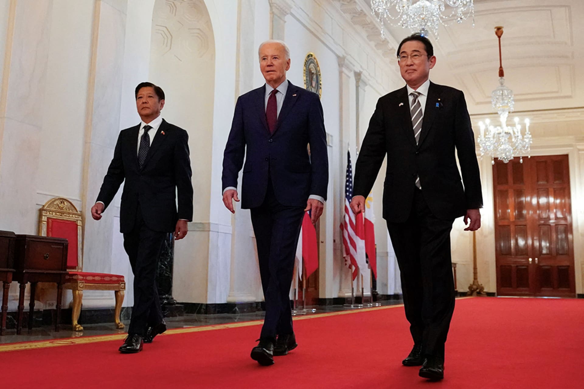 U.S. President Joe Biden escorts Philippines President Ferdinand Marcos Jr. and Japan Prime Minister Fumio Kishida to their trilateral summit at the White House in Washington, DC. Kevin Lamarque/Reuters