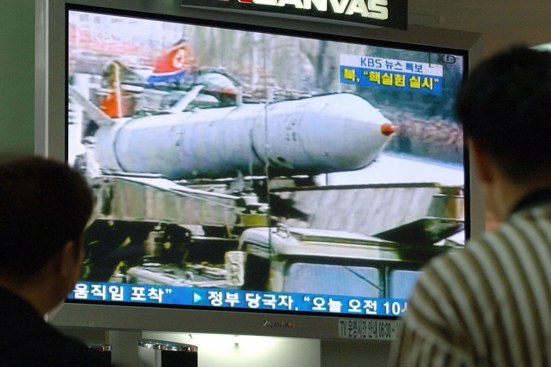 South Korean television broadcasts North Korea’s first nuclear test. Jung Yeon-je/AFP/Getty Images