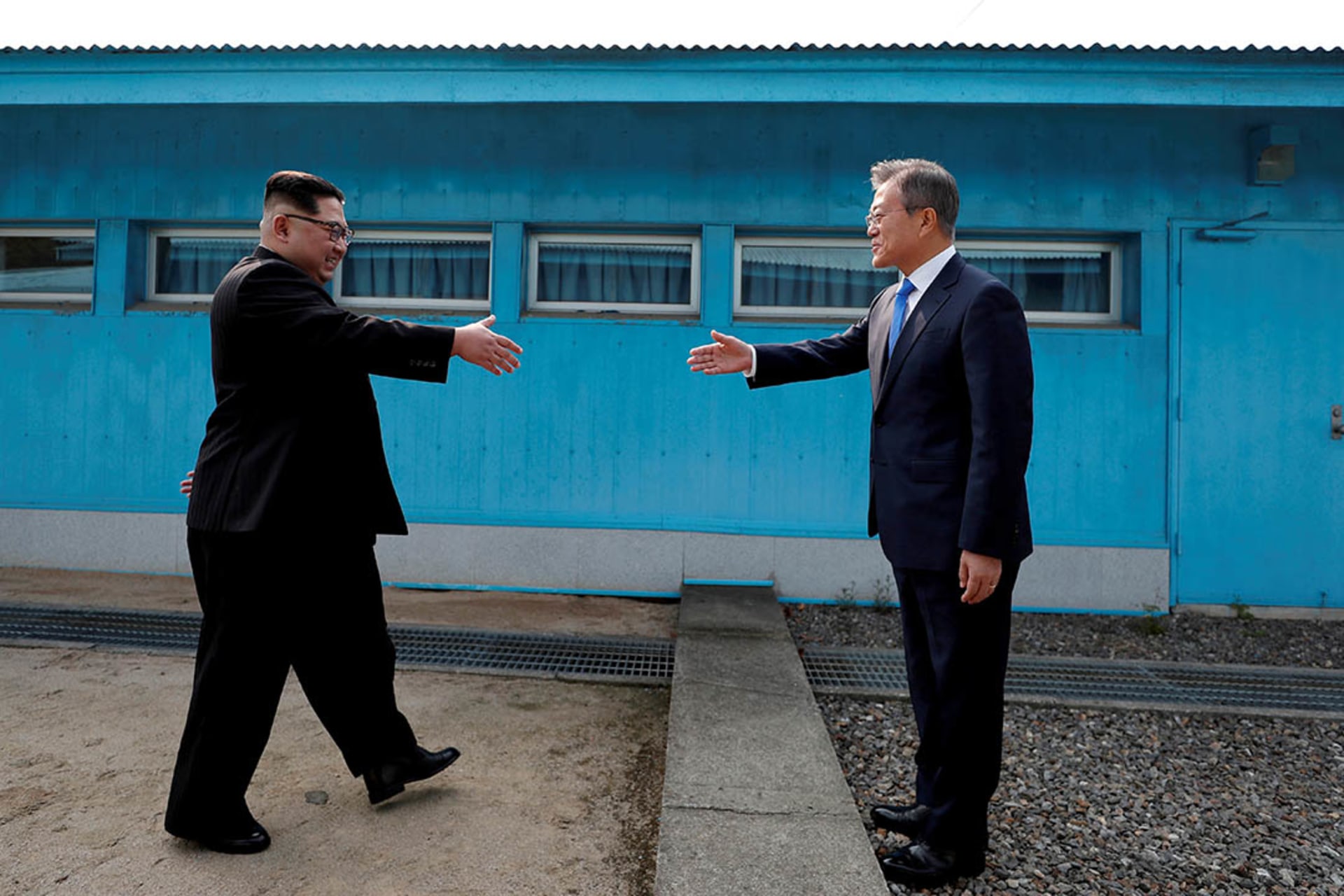 Kim and Moon meet in the demilitarized zone separating the two Koreas. Reuters