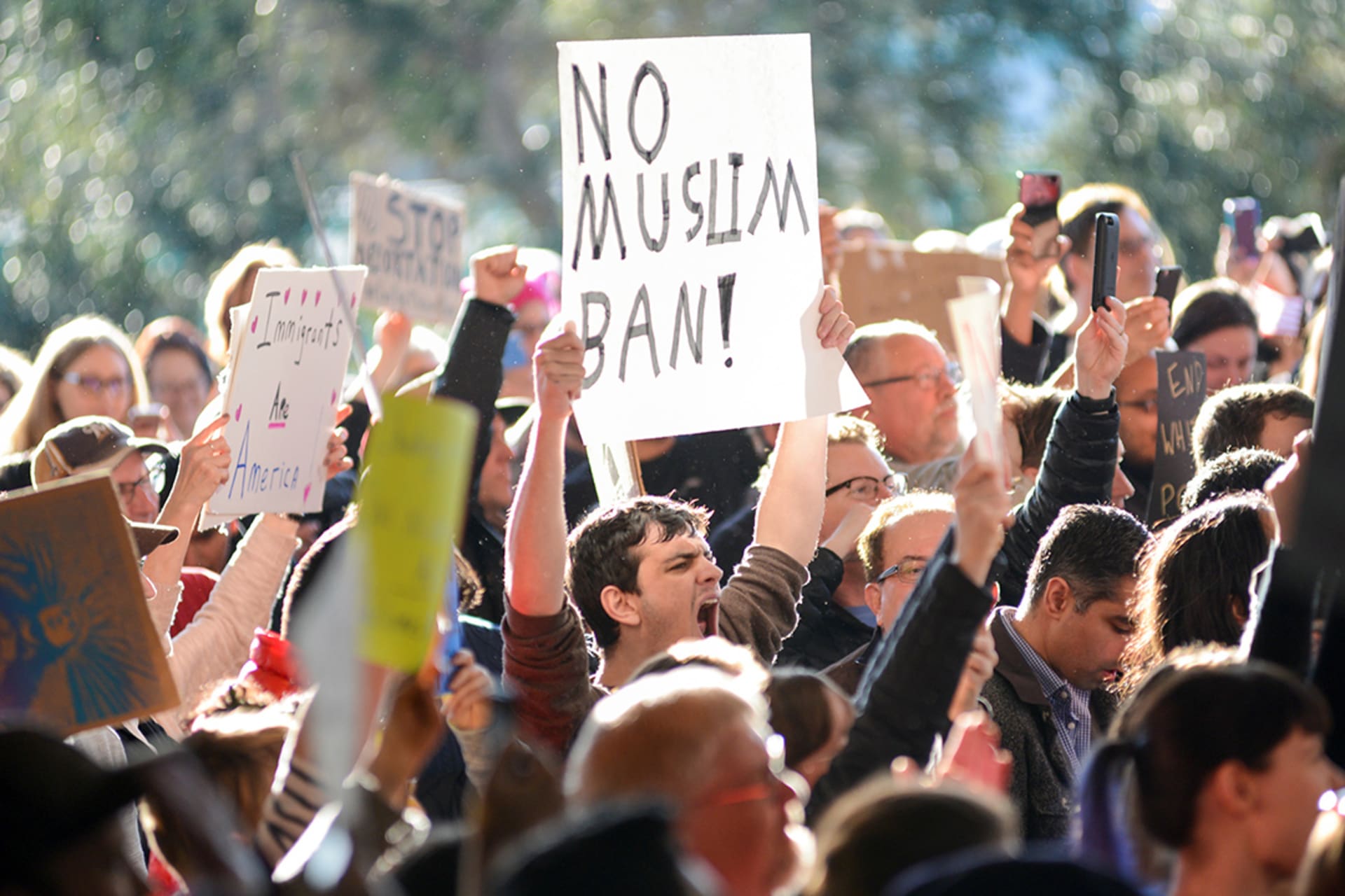 Demonstrators protest outside San Francisco International Airport. Kate Munsch/Reuters