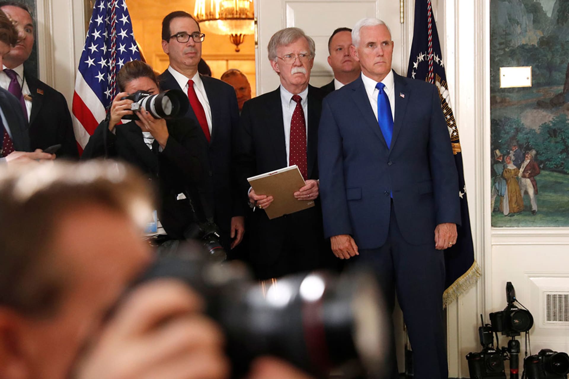 Treasury Secretary Steve Mnuchin, National Security Adviser John Bolton, and Vice President Mike Pence await remarks from Trump on the Iran nuclear accord. Jonathan Ernst/Reuters
