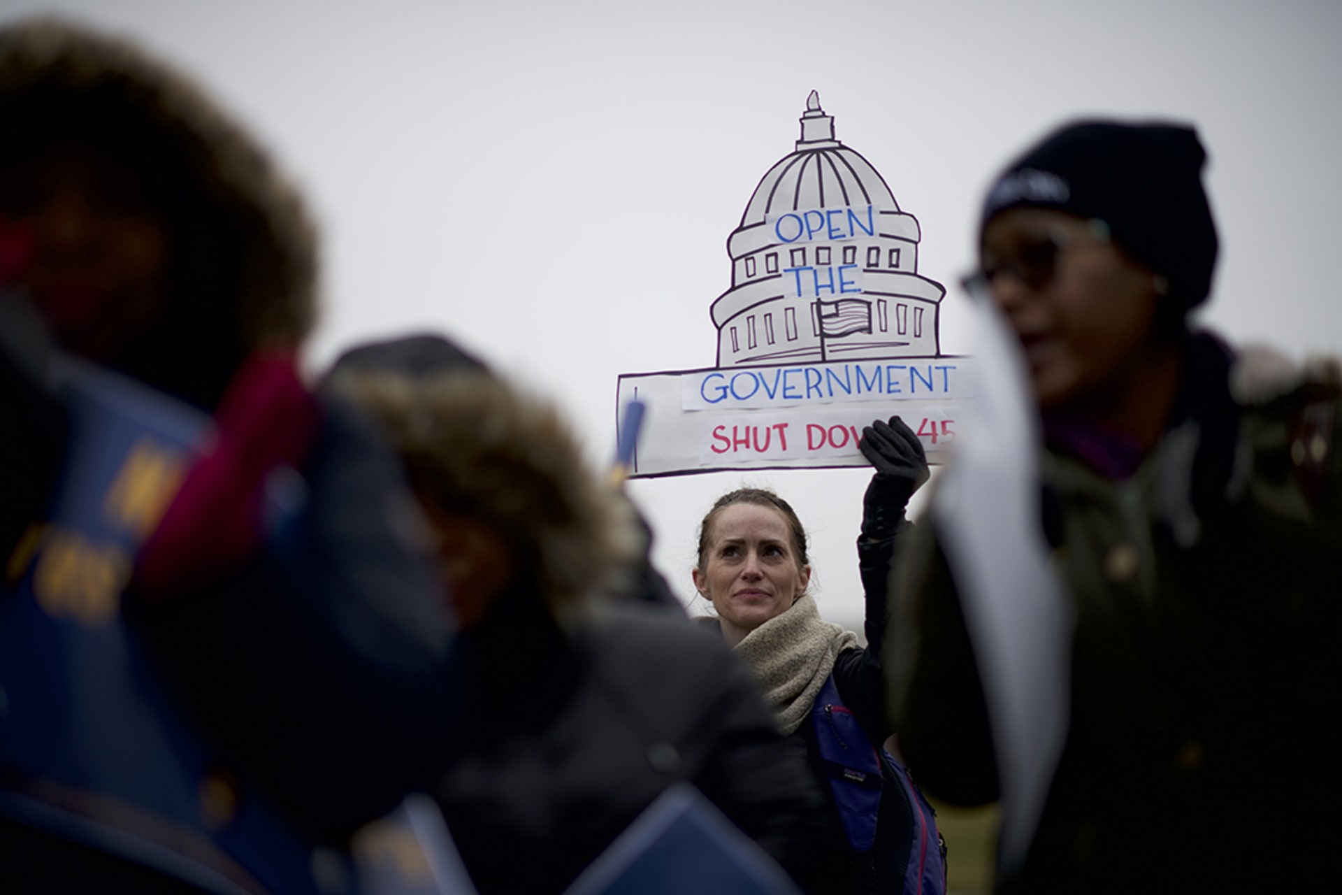 Federal workers call for an end to the government shutdown in January 2019. Mark Makela/Getty Images