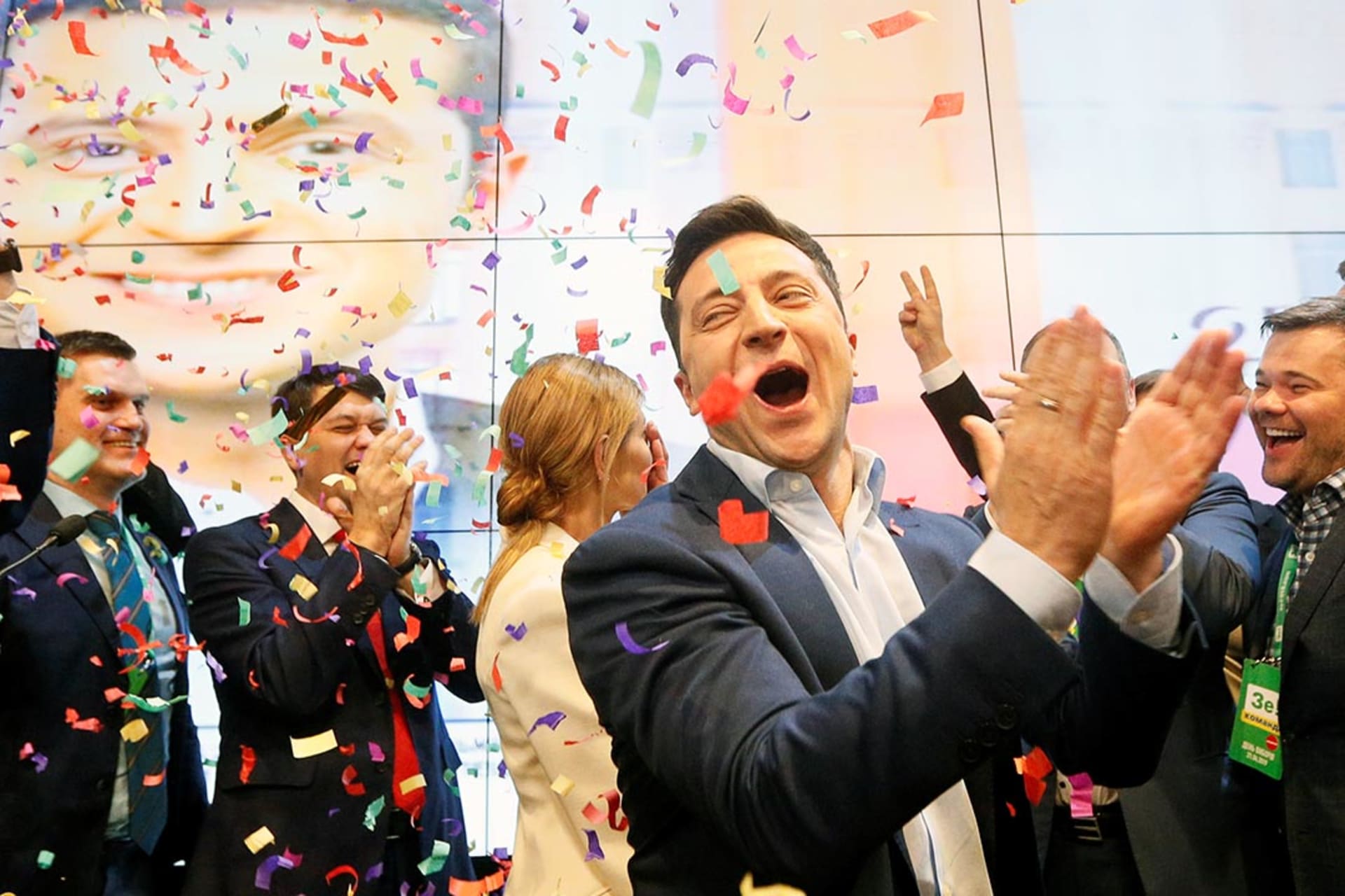 Volodymyr Zelensky celebrates following the announcement of the first exit poll at his campaign headquarters.
