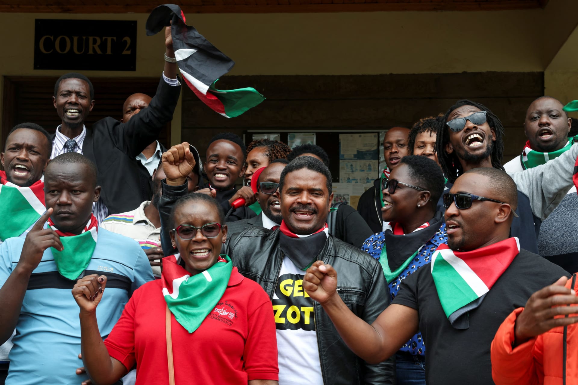 <p>Kenyan activists protest after human rights activist Boniface Mwangi was charged with unlawful possession of ammunition over his alleged role in deadly anti-government protests in June, at the Kahawa Law Courts in Kiambu County, Kenya July 21, 2025. </p>