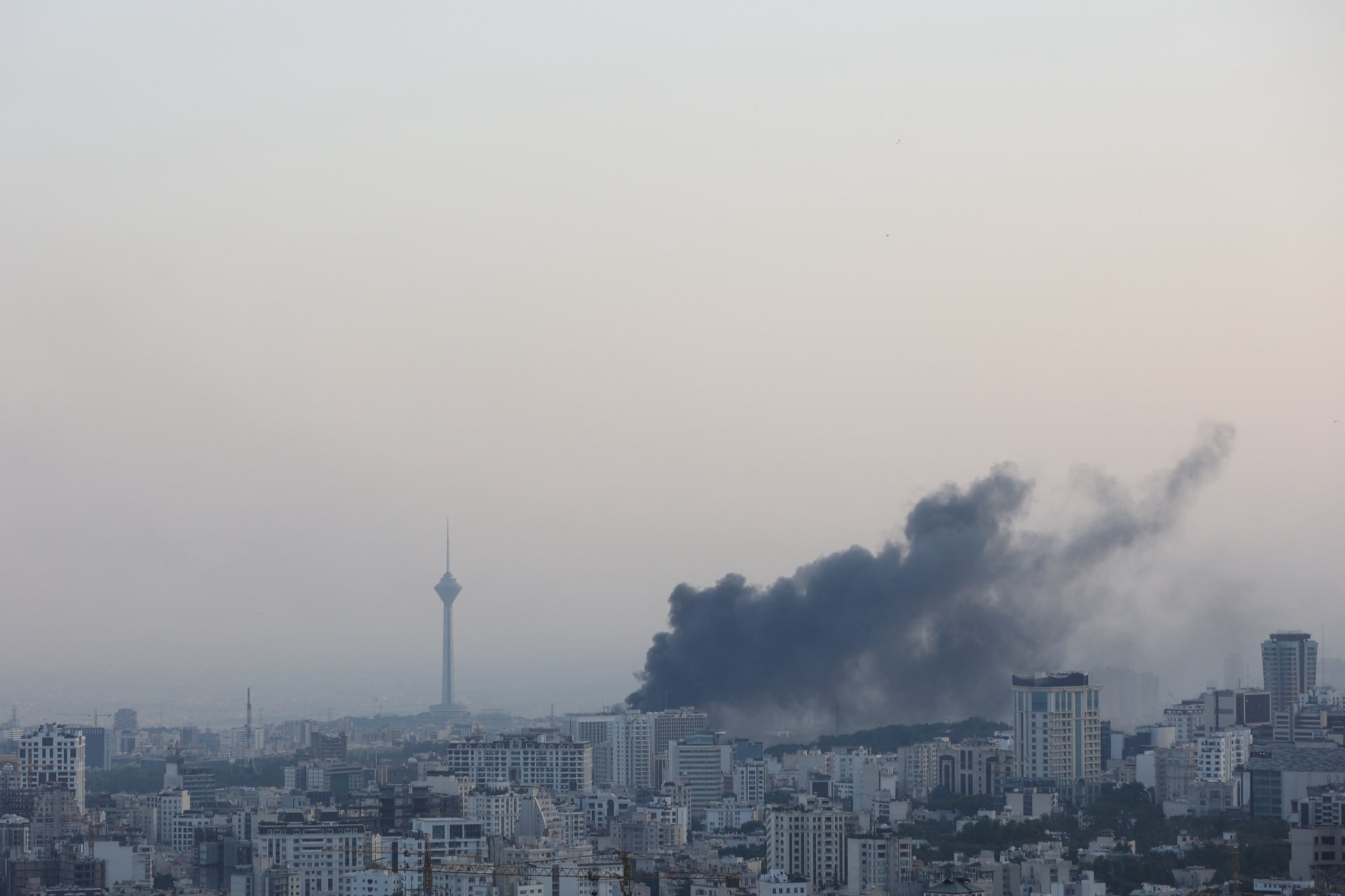 <p>Smoke rises after an Israeli air strike on the Tehran building housing Iran’s state broadcaster on June 16, 2025.</p>
