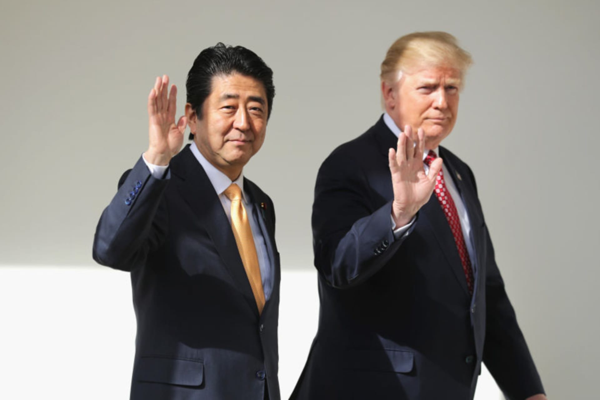 <p>U.S. President Donald Trump and Japan Prime Minister Shinzo Abe walk to their joint press conference at the White House on February 10, 2017.</p>
