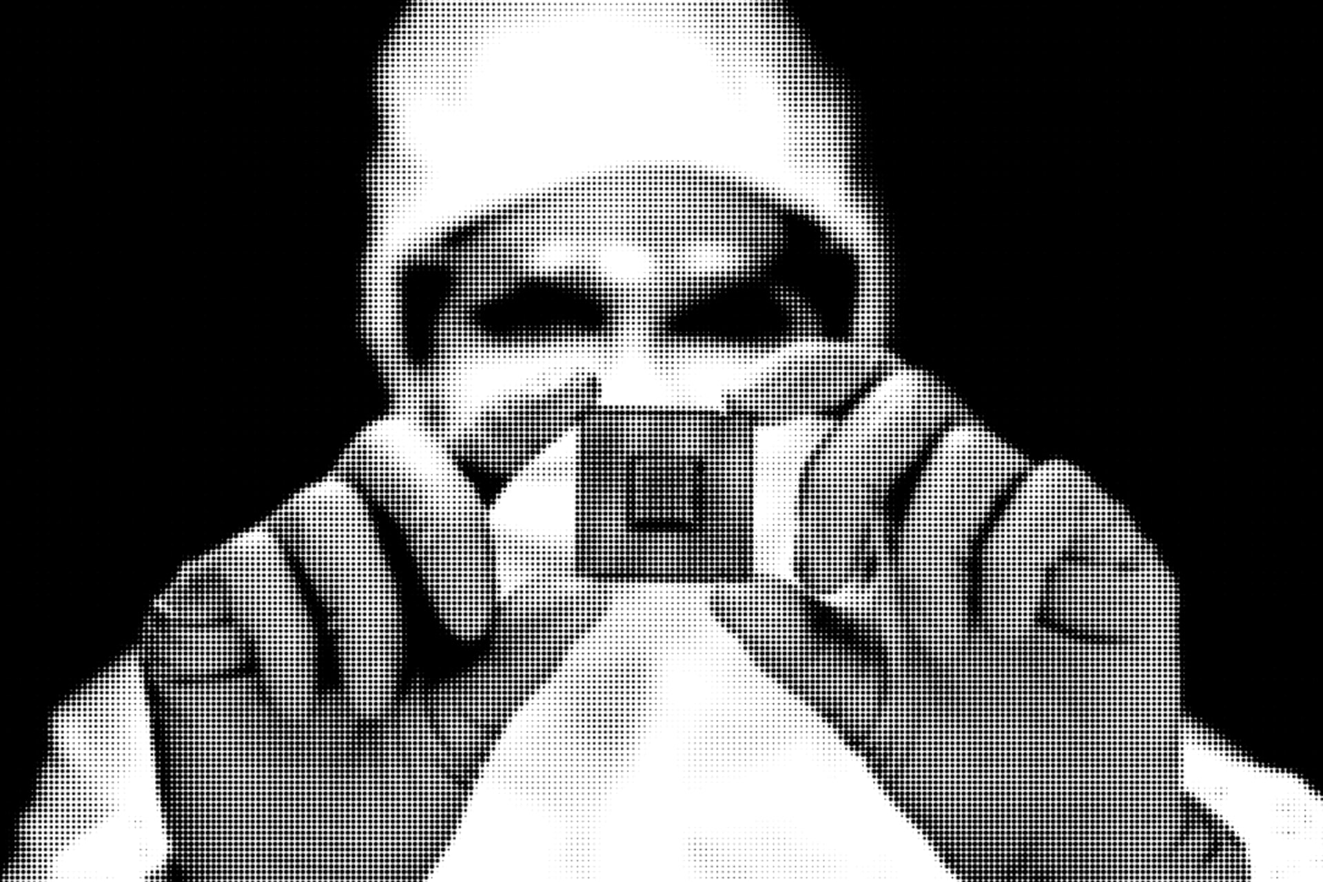 <p>Engineer analyzing computer chip in laboratory.</p>