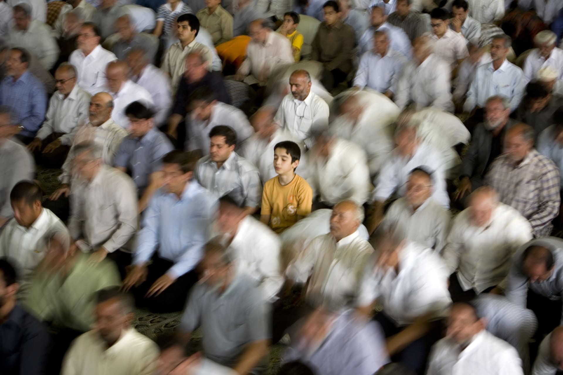 <p>Iranian worshippers pray during Friday prayers in Tehran.</p>