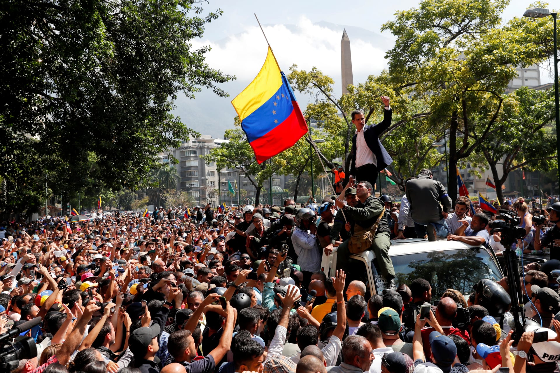 <p>Venezuelan opposition leader Juan Guaido protests in Caracas.</p>
