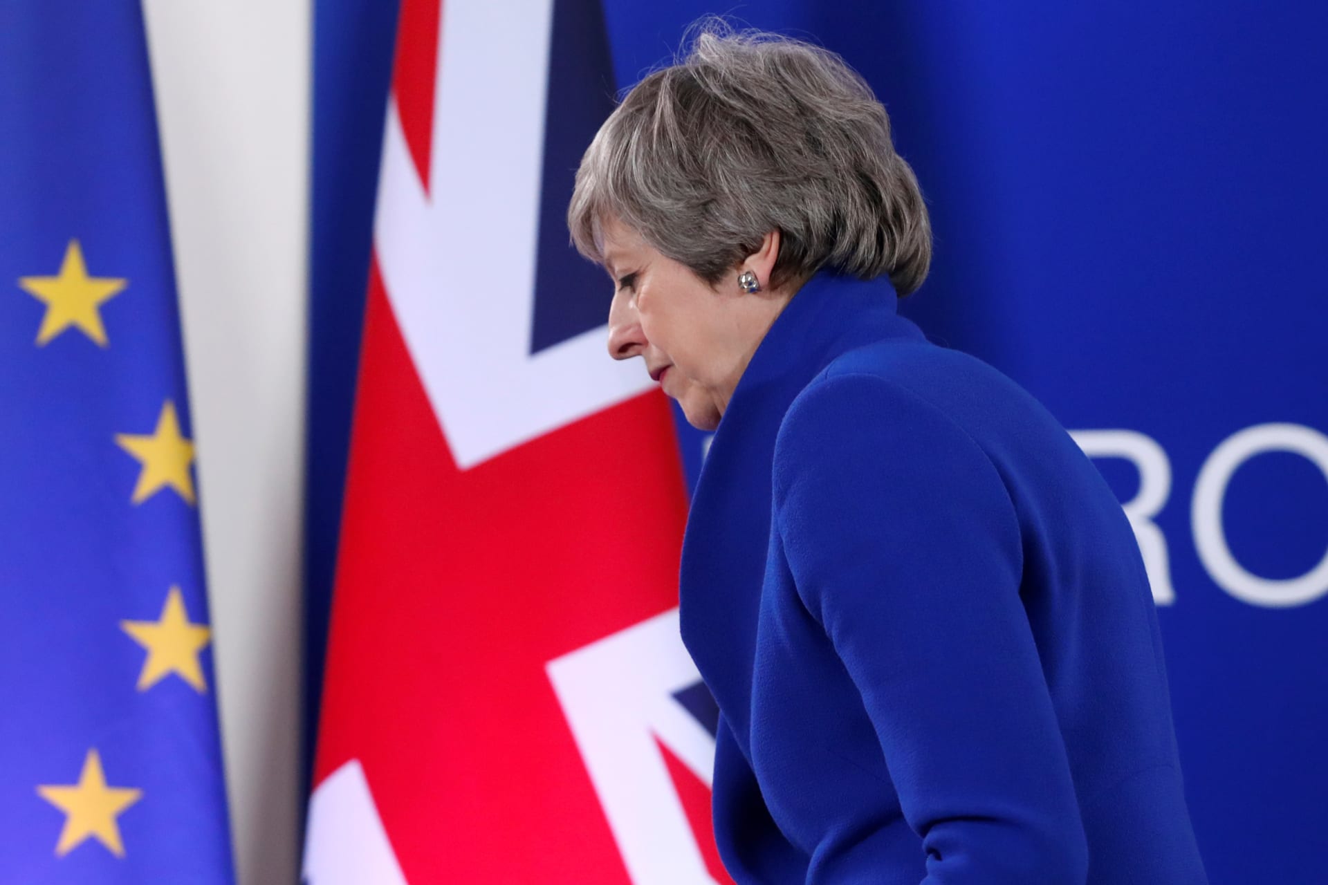 <p>British Prime Minister Theresa May leaves after holding a news conference to discuss Brexit.</p>
