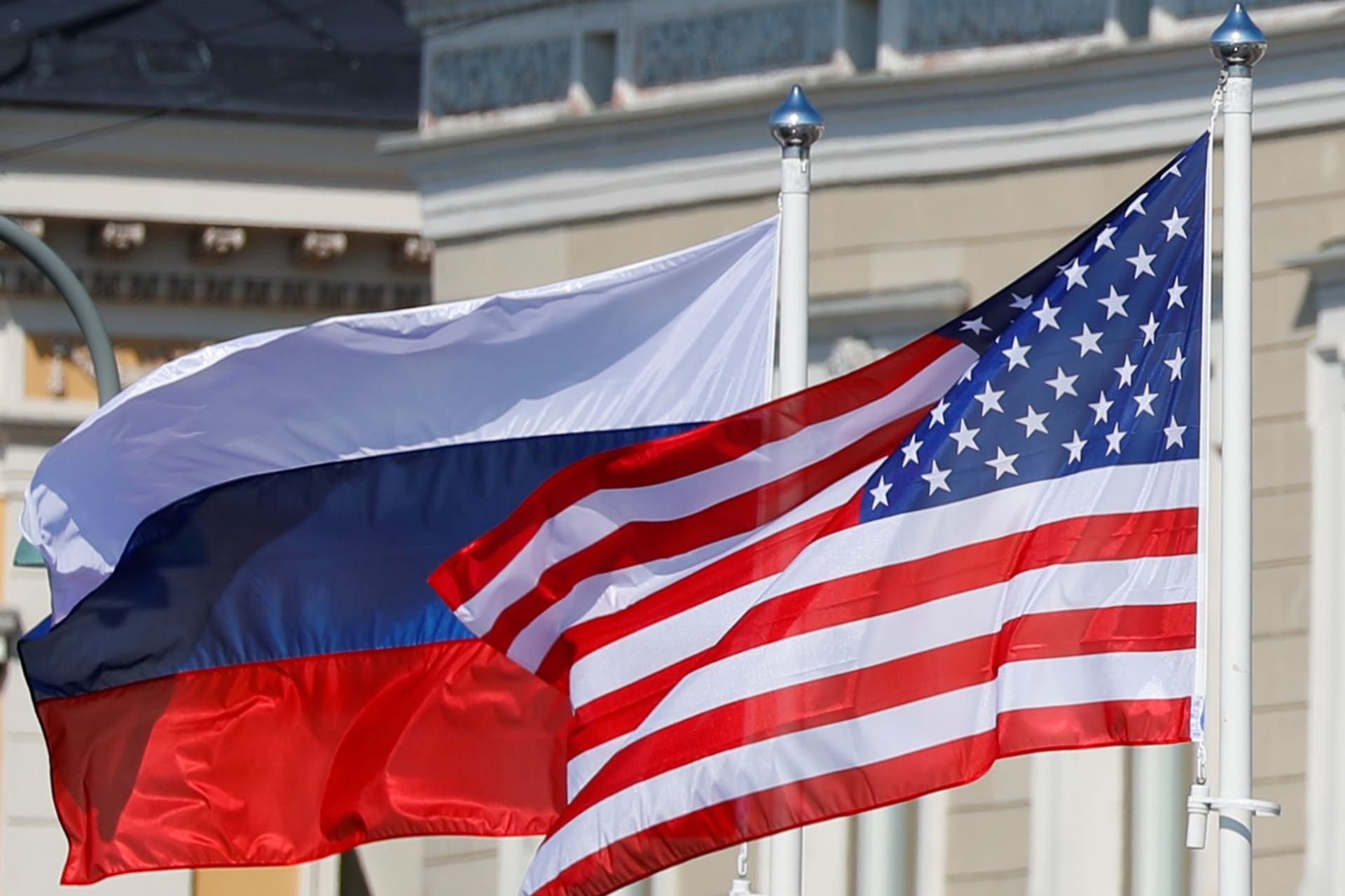 <p>U.S. and Russian flags are seen flying outside the Presidential Palace prior to President Trump and Russia’s President Vladimir Putin’s meeting in Helsinki.</p>

