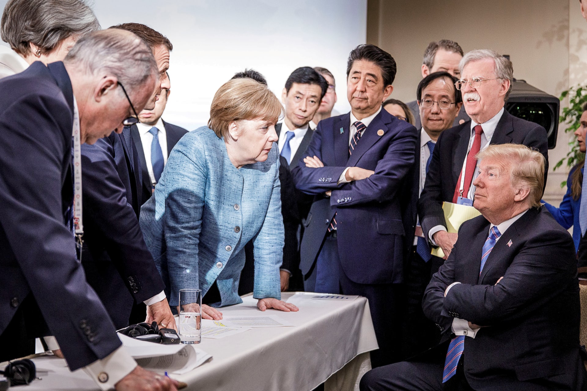 <p>German Chancellor Angela Merkel speaks to U.S. President Donald Trump during the second day of the G7 meeting in Quebec, Canada.</p>