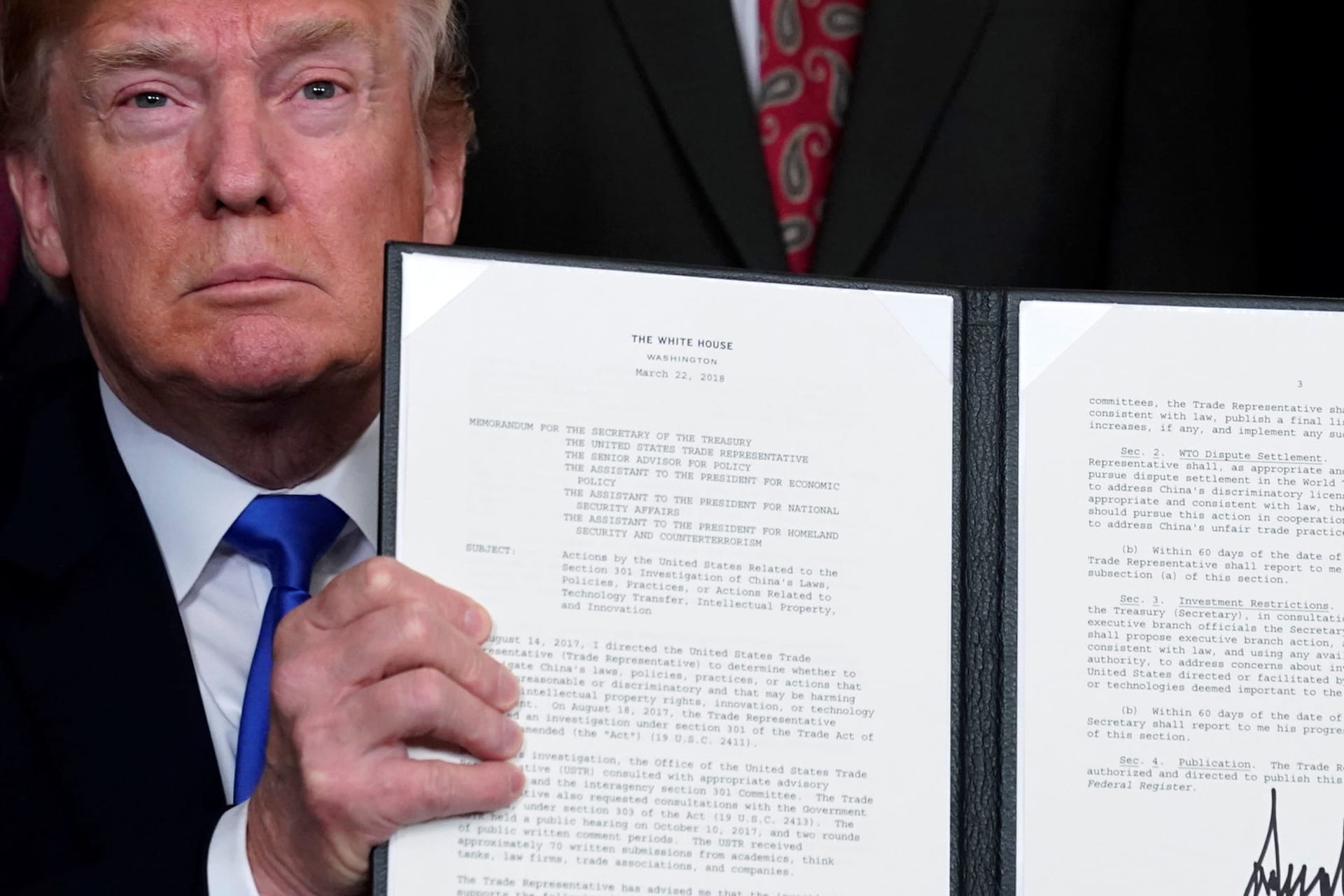 <p>President Trump signs a memo regarding tariffs on Chinese goods. </p>
