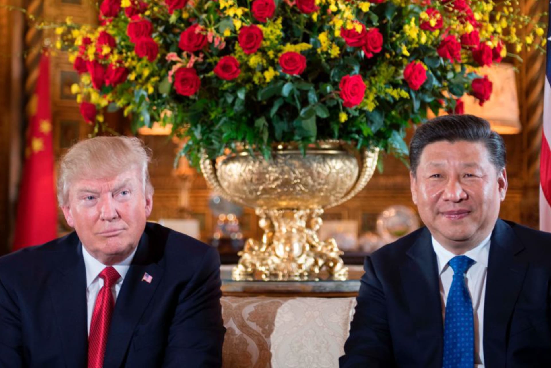 <p>US President Donald Trump (L) sits with Chinese President Xi Jinping (R) during a bilateral meeting at the Mar-a-Lago estate in Florida.</p>
