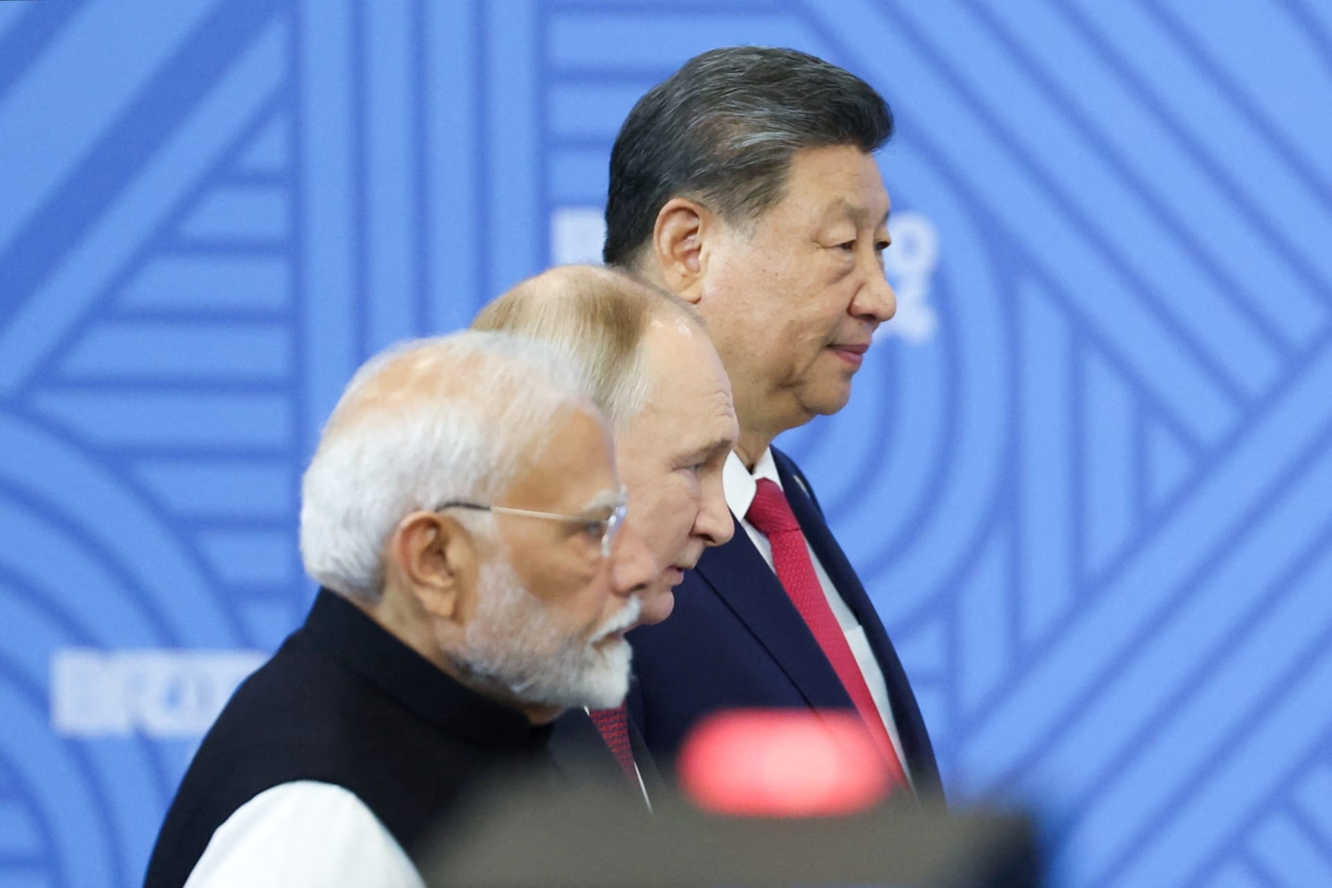 <p>Chinese President Xi Jinping, Russian President Vladimir Putin, and Indian Prime Minister Narendra Modi stand before a plenary session of the BRICS 2024 summit in Kazan, Russia, on October 23, 2024.</p>
