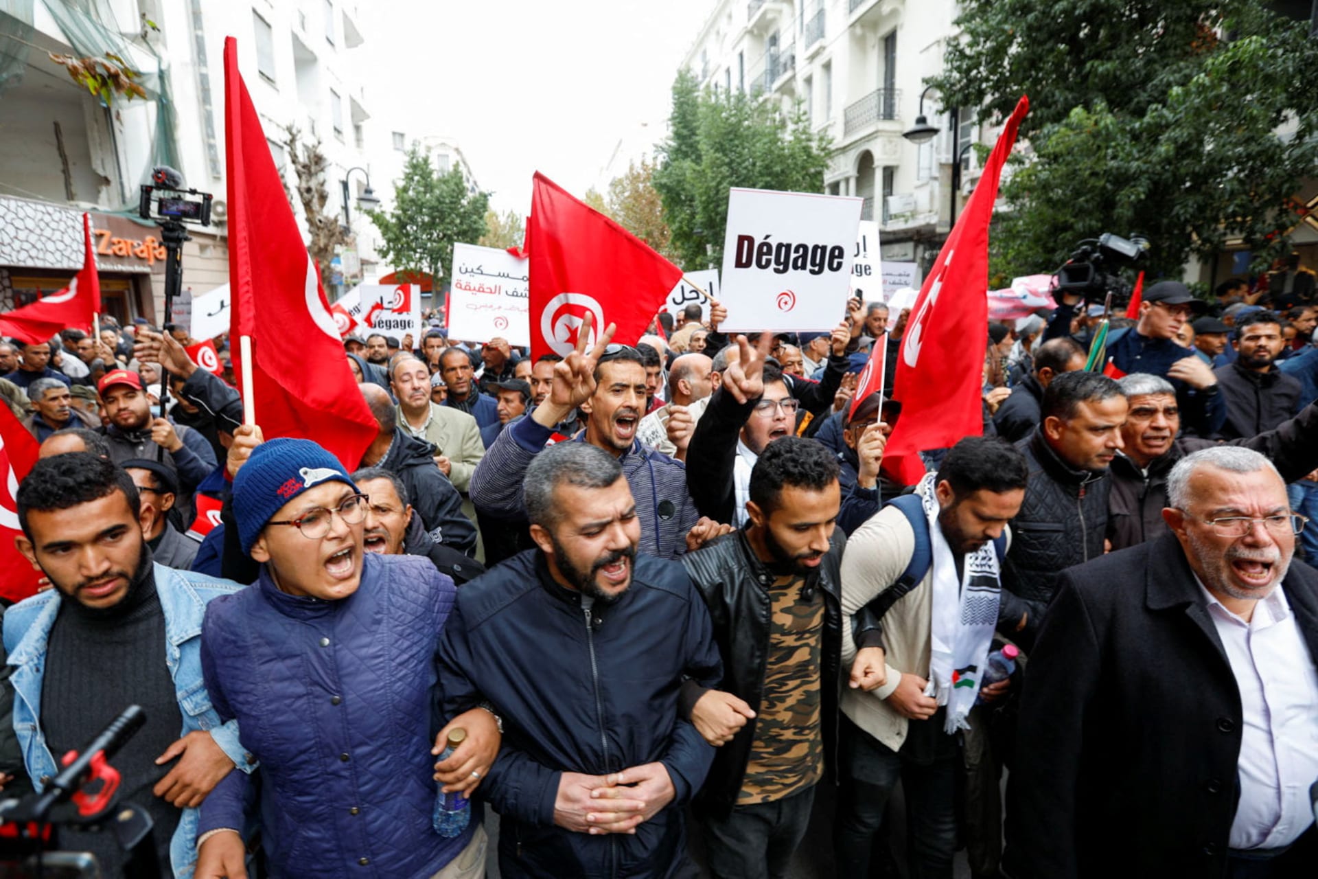 Tunisia’s Election, U.S. Congress Seeks to Avert Shutdown, World Cup Ends, and More Picture