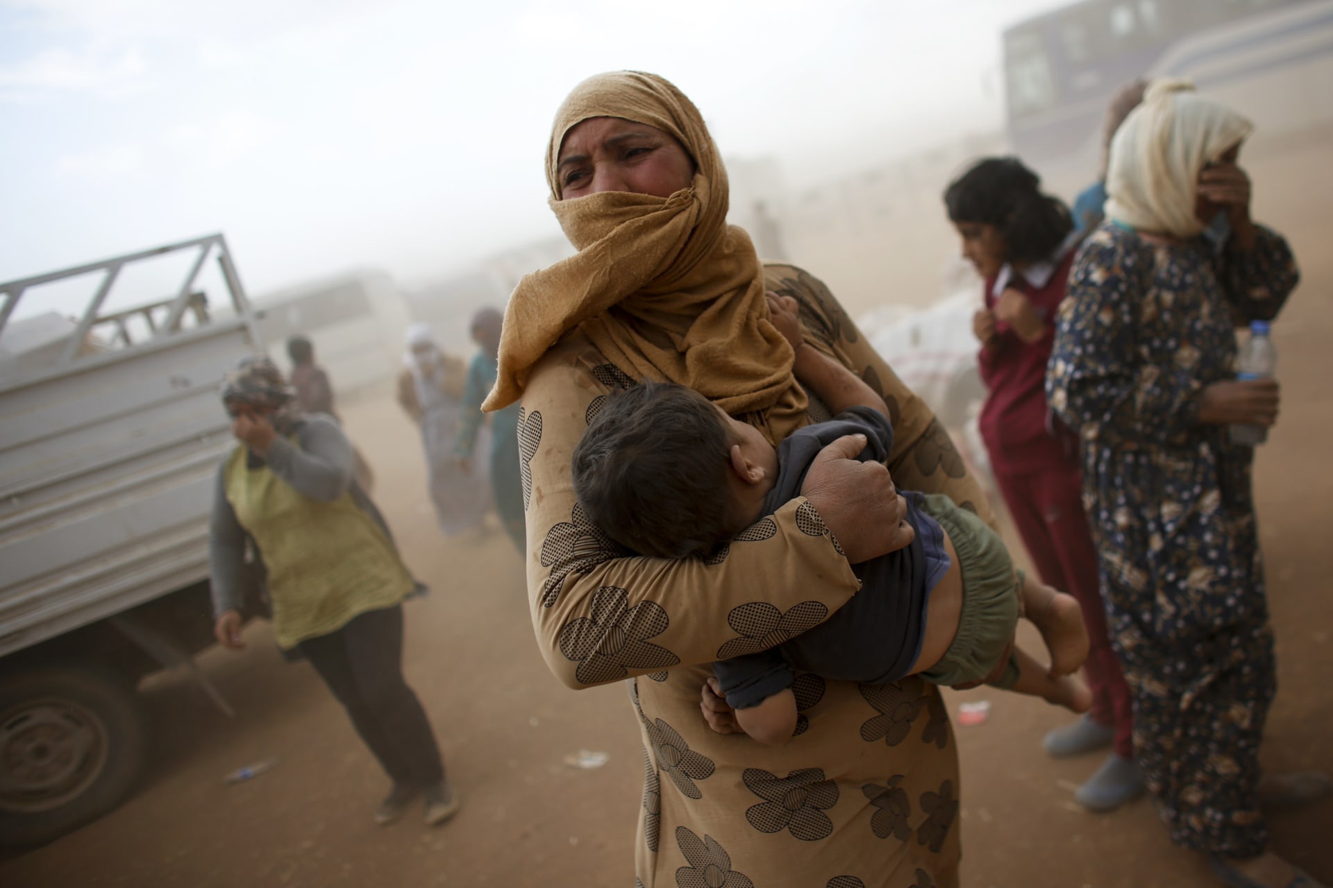<p>A Kurdish Syrian refugee on the Turkey-Syria border.</p>
