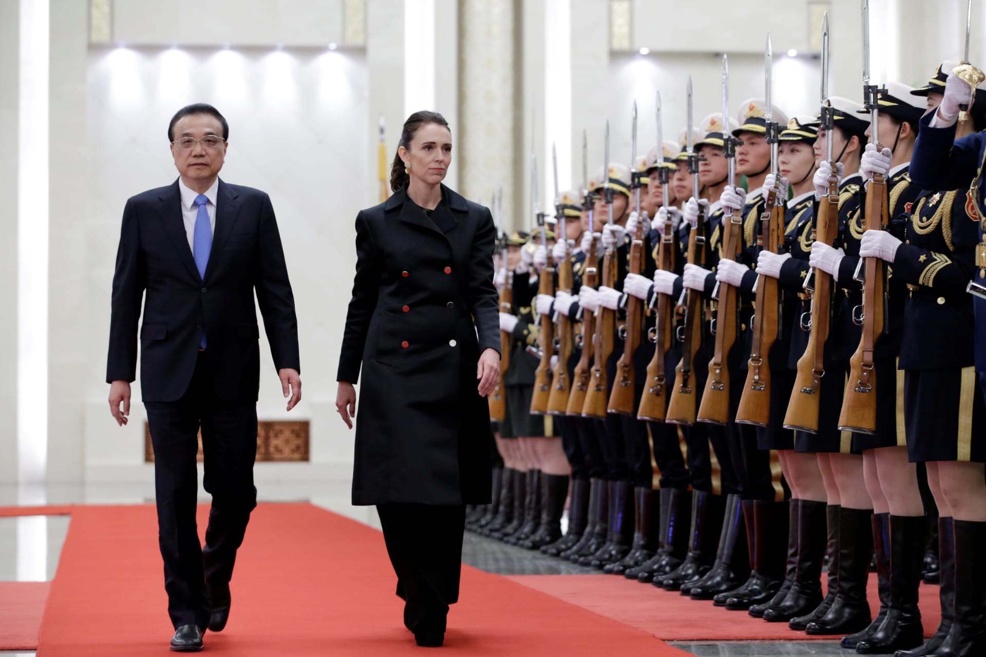 <p>New Zealand Prime Minister Jacinda Ardern and China’s Premier Li Keqiang attend a welcome ceremony at the Great Hall of the People in Beijing, China, April 1, 2019.</p>