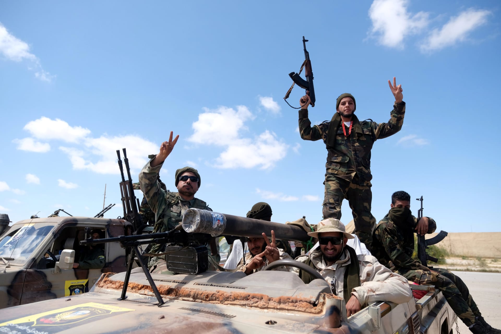 <p>Libyan National Army members, commanded by Khalifa Haftar, pose for a picture.</p>
