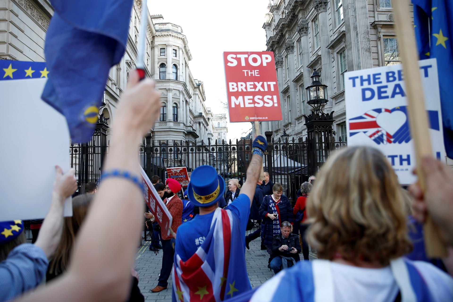 <p>Anti-Brexit protesters shout outside Downing Street in London.</p>
