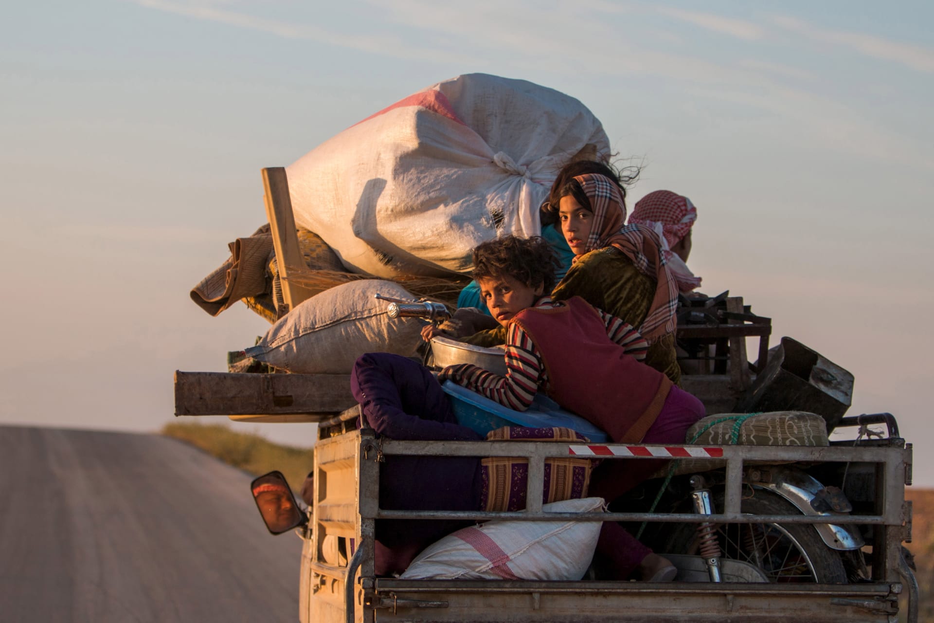 <p>Residents return to their villages after Kurdish fighters retake territory from the Islamic State in Ras al-Ain, May 13, 2015.</p>
