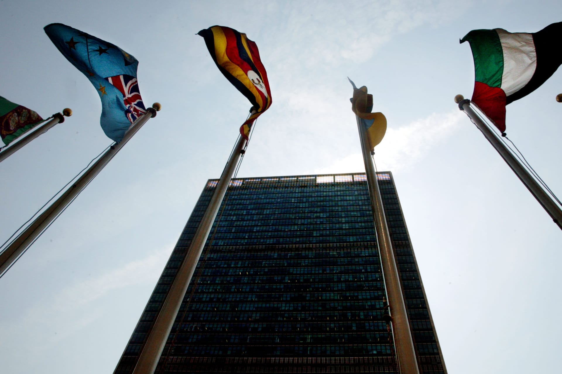 <p>Flags fly over United Nations Headquarters in New York City.</p>
