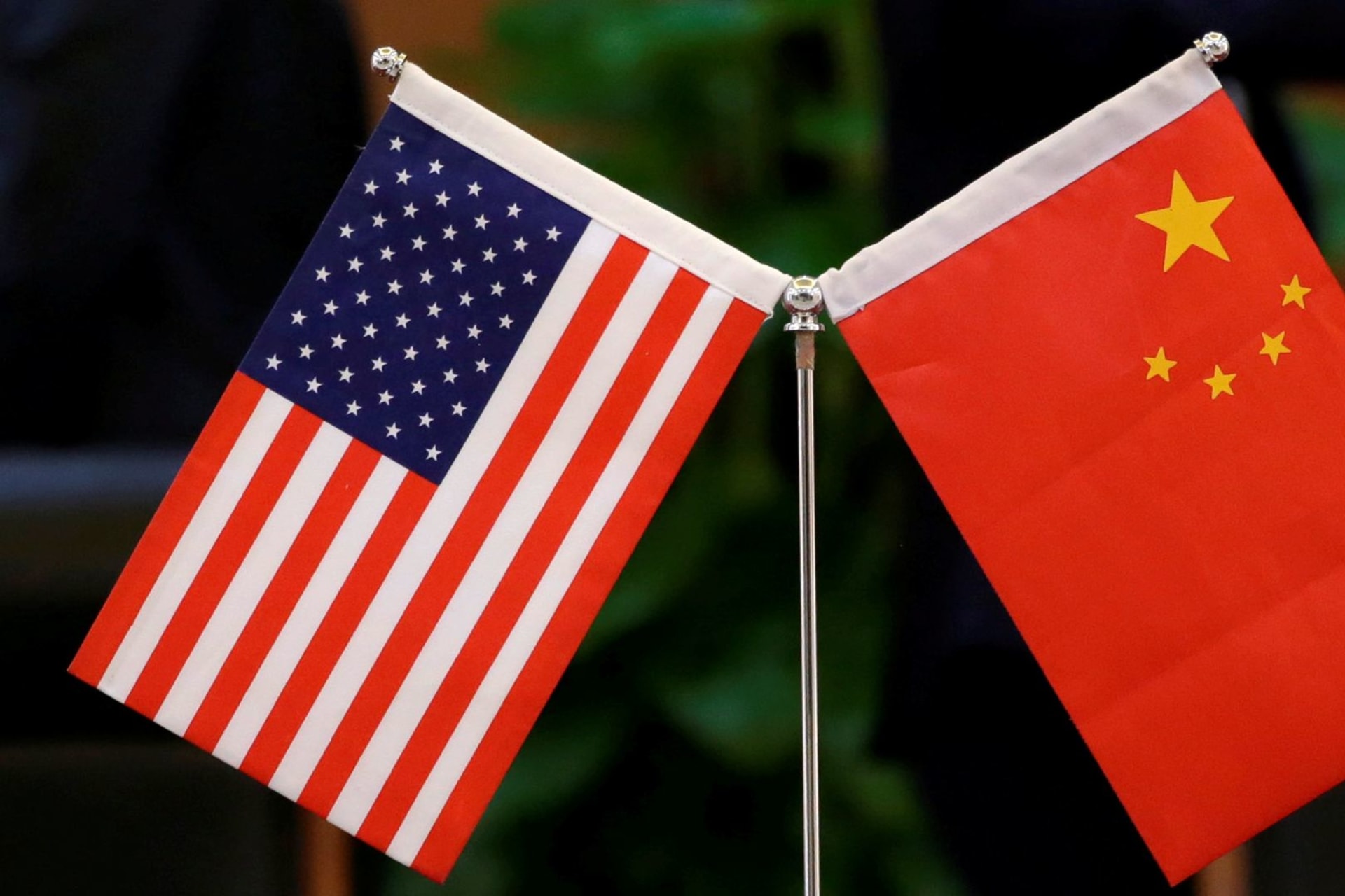 <p>Chinese and U.S. flags are set up for a signing ceremony at China’s Ministry of Transport in Beijing.</p>