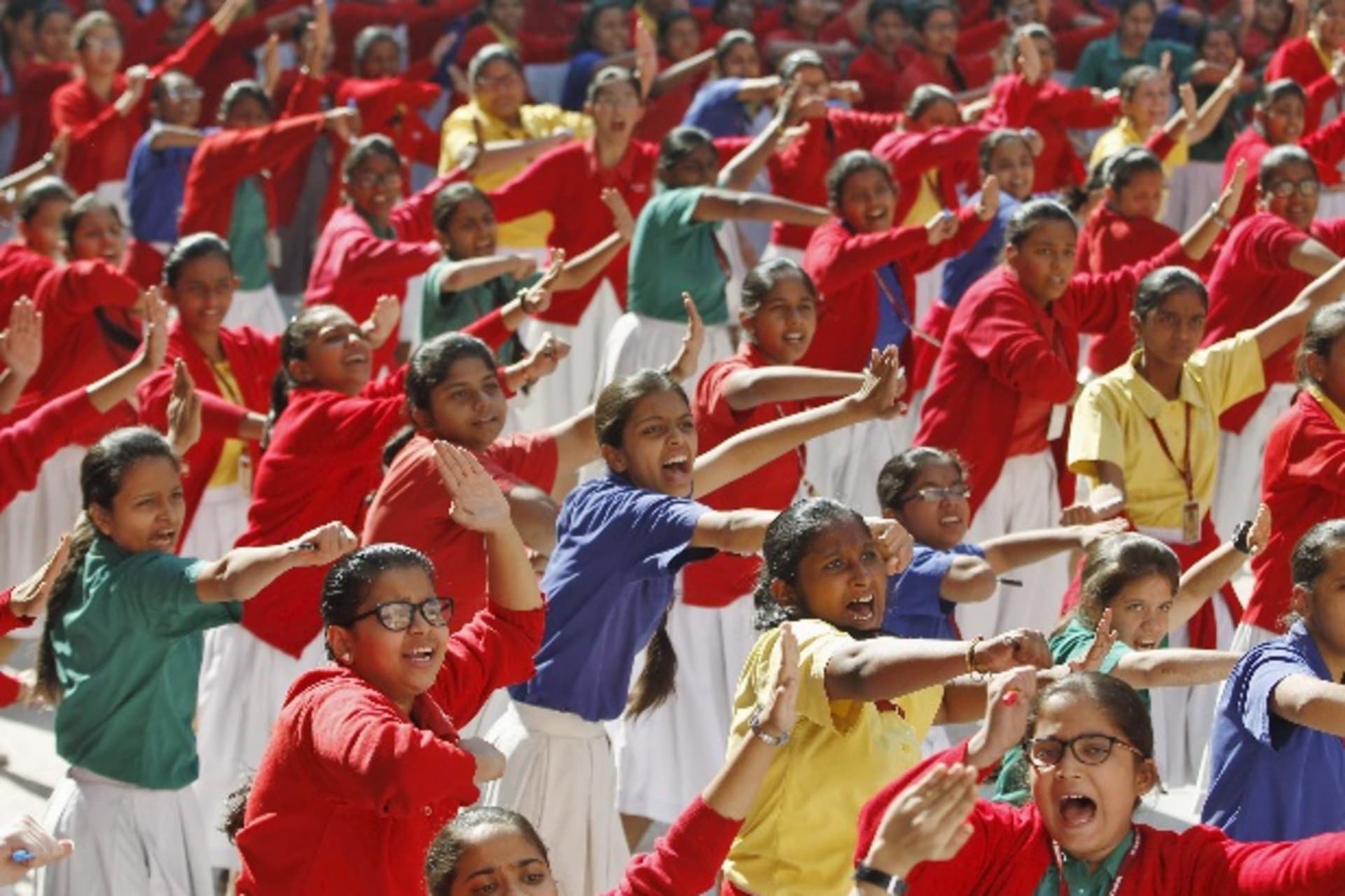<p>Schoolgirls practice martial arts during an event in Ahmedabad, India, December 16, 2015, to mark the third anniversary of the fatal gang rape of a woman on a Delhi bus in December 2012. REUTERS/Amit Dave</p>
