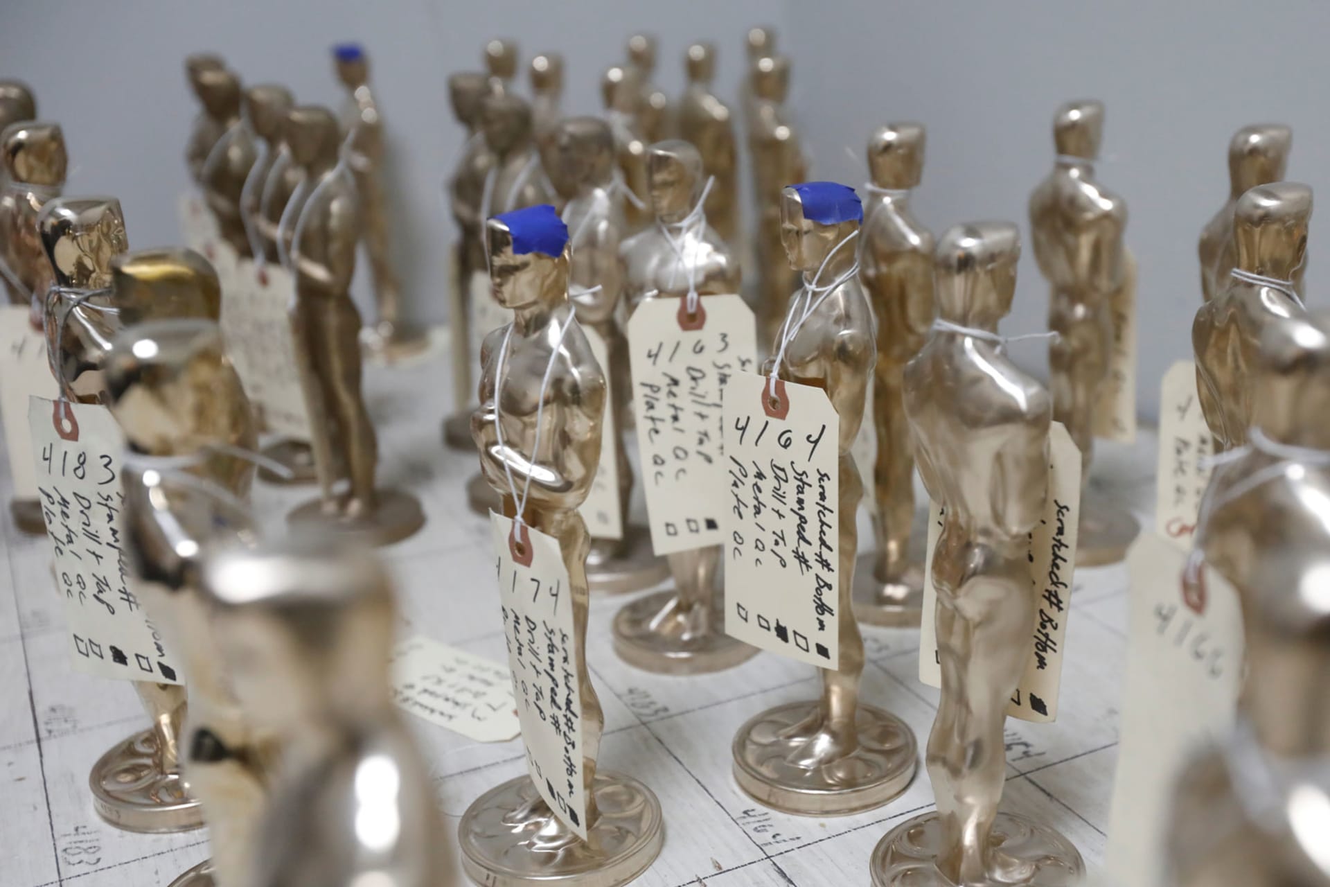 <p>Oscar statuettes in production leading up to the Academy Awards. </p>
