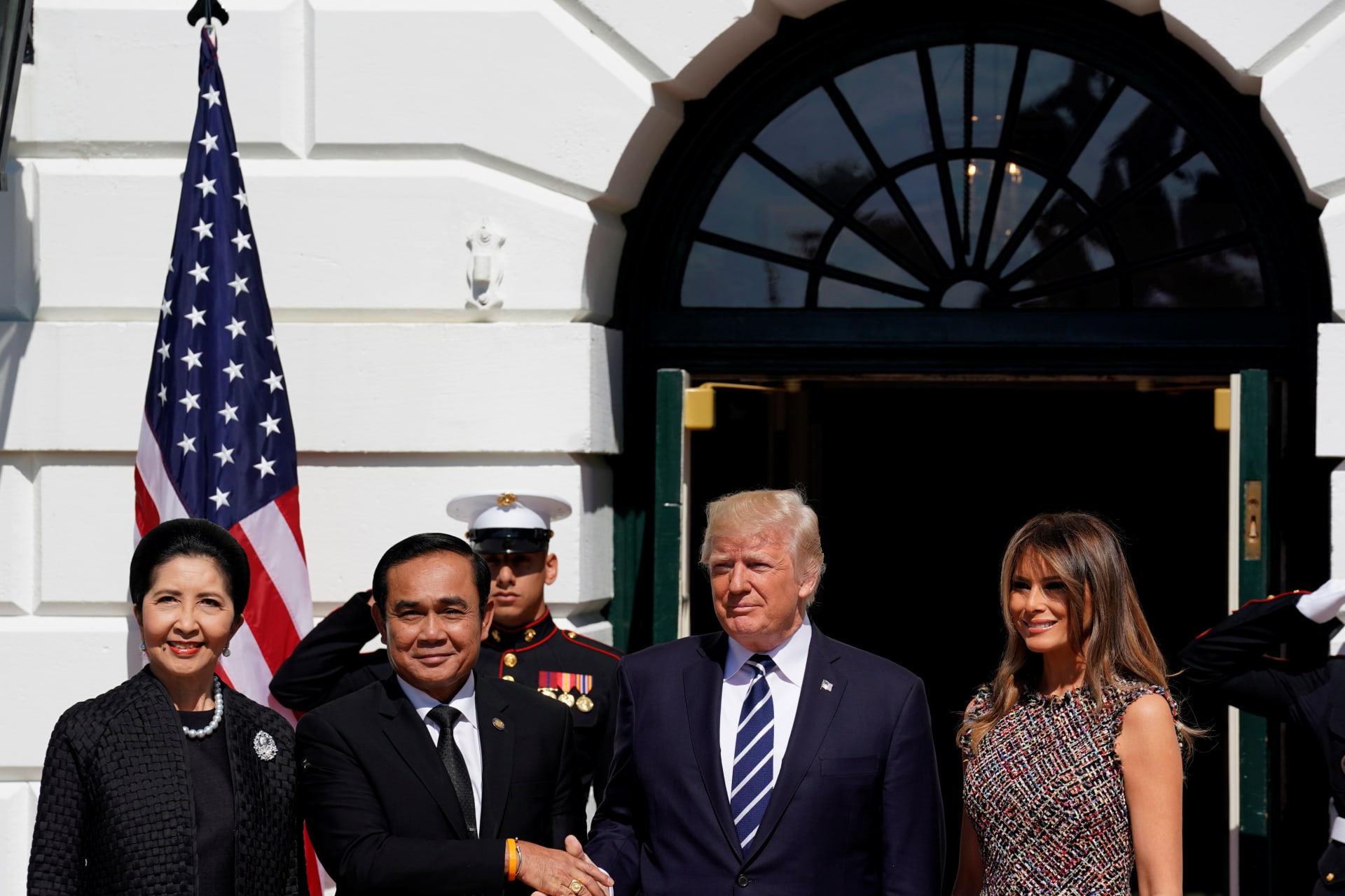 <p>U.S. President Donald Trump and U.S. first lady Melania Trump greet Thai Prime Minister Prayut Chan-o-Cha and his wife Naraporn Chan-o-Cha at the White House in Washington, U.S., October 2, 2017. </p>

