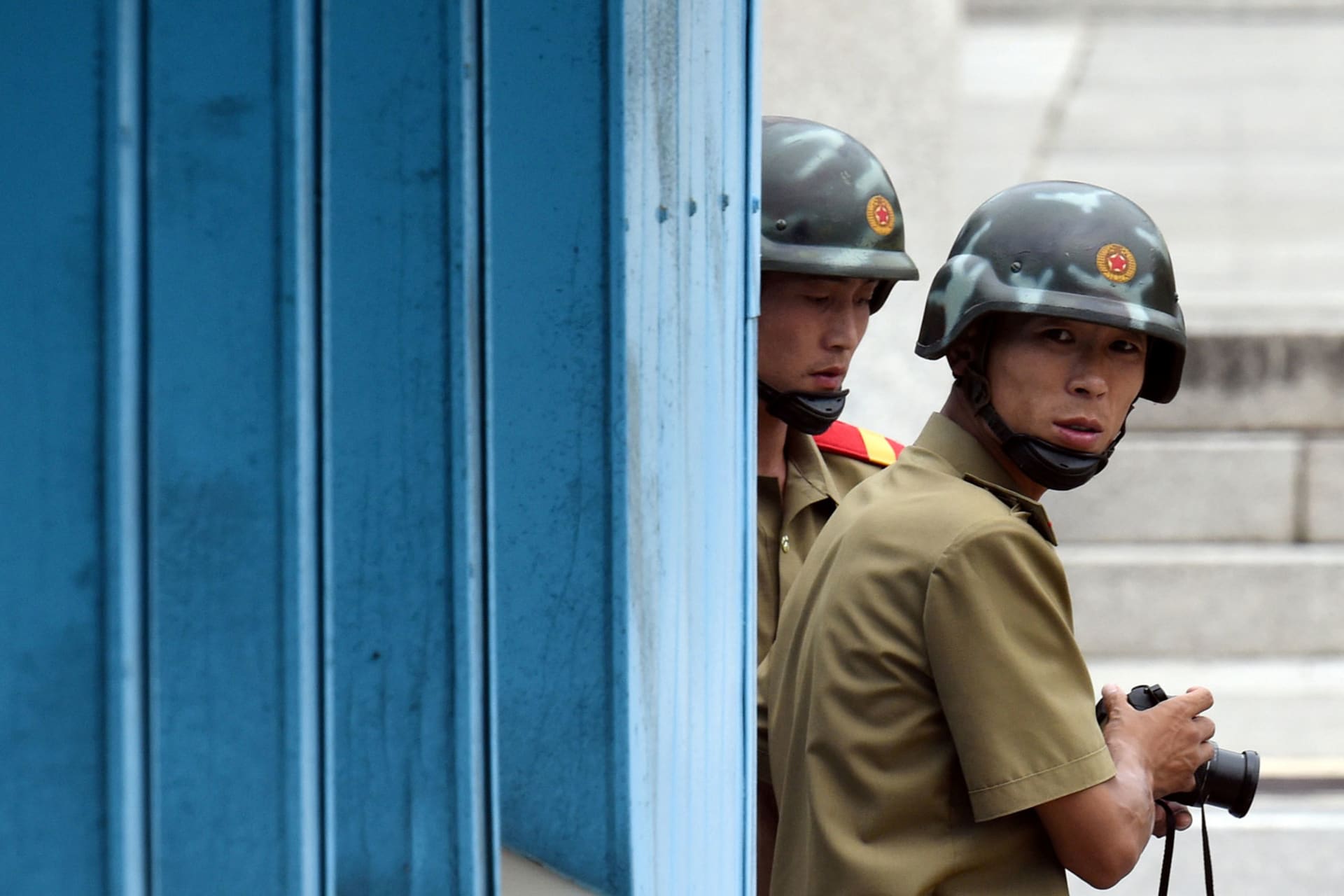 <p>North Korean soldiers at the demilitarized zone dividing the two Koreas.</p>
