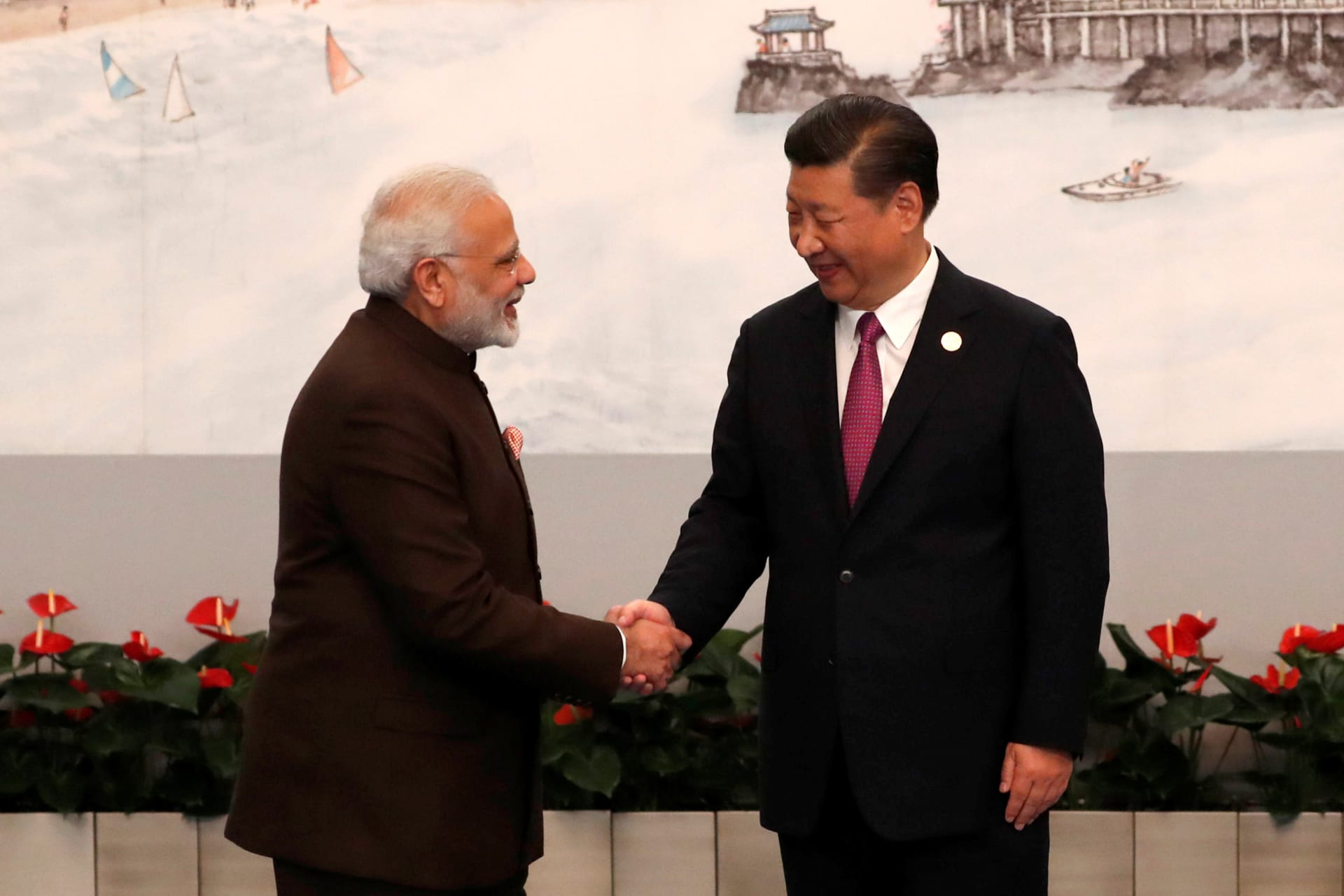<p>Indian Prime Minister Narendra Modi and Chinese President Xi Jinping shake hands before the welcoming banquet for the BRICS Summit, in Xiamen</p>
