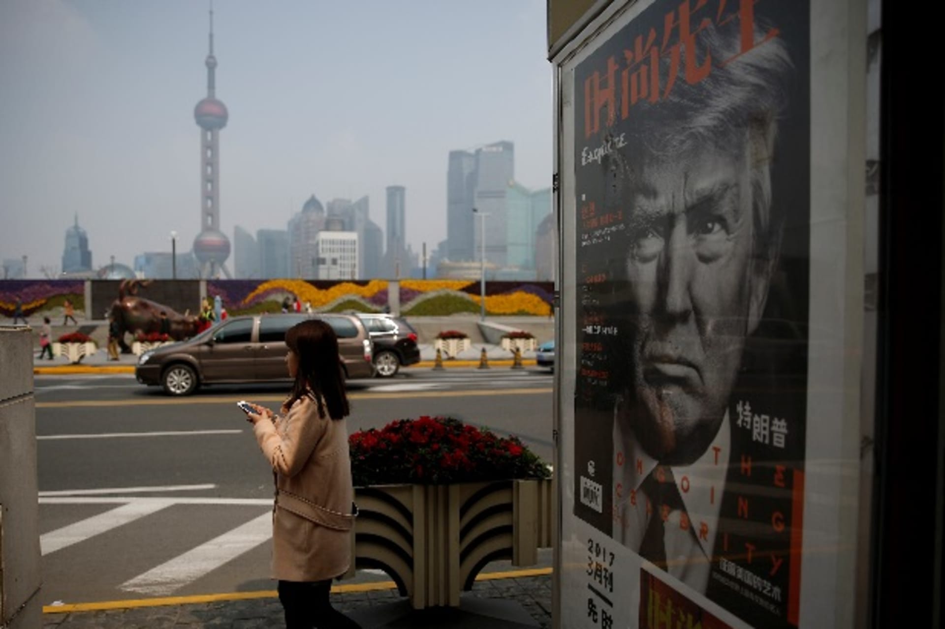 <p>A Chinese magazine poster showing U.S. President Donald Trump is displayed at a newsstand in Shanghai, China on March 21, 2017. U.S. and Chinese citizens are anticipating a summit between Donald Trump and Xi Jinping this week.</p>
