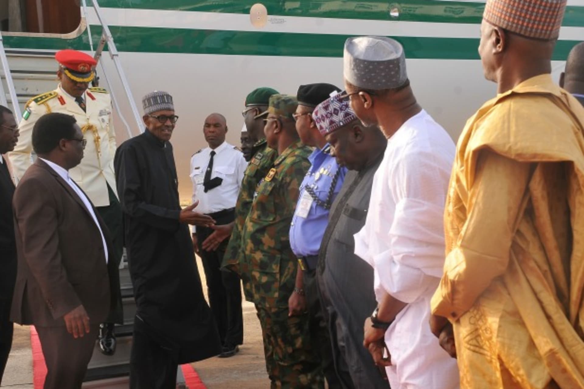 <p>Nigeria’s President Muhammadu Buhari returns from a medical trip in London at the Nigeria Airforce Base in Kaduna, Nigeria, March 10, 2017. (Reuters/Stringer)</p>
