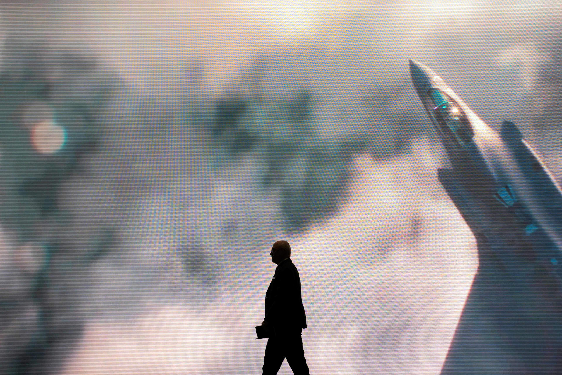 <p>A man walks past a Lockheed Martin video presentation during the Association of the United States Army annual meeting and exposition in Washington, D.C., October 14, 2024. </p>
