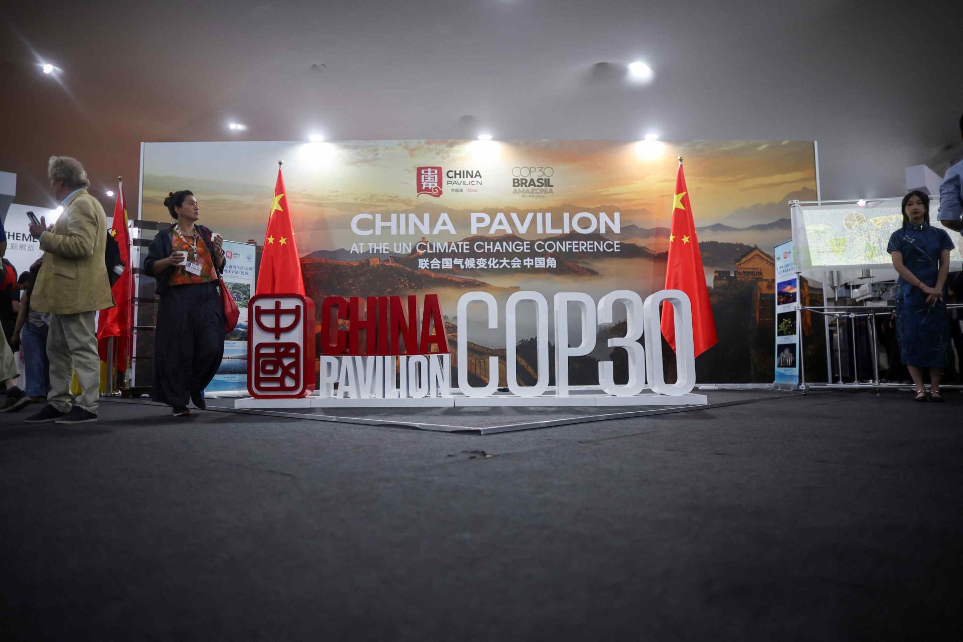 <p>Attendees gather near China’s pavilion at COP30 in Belém, Brazil.</p>
