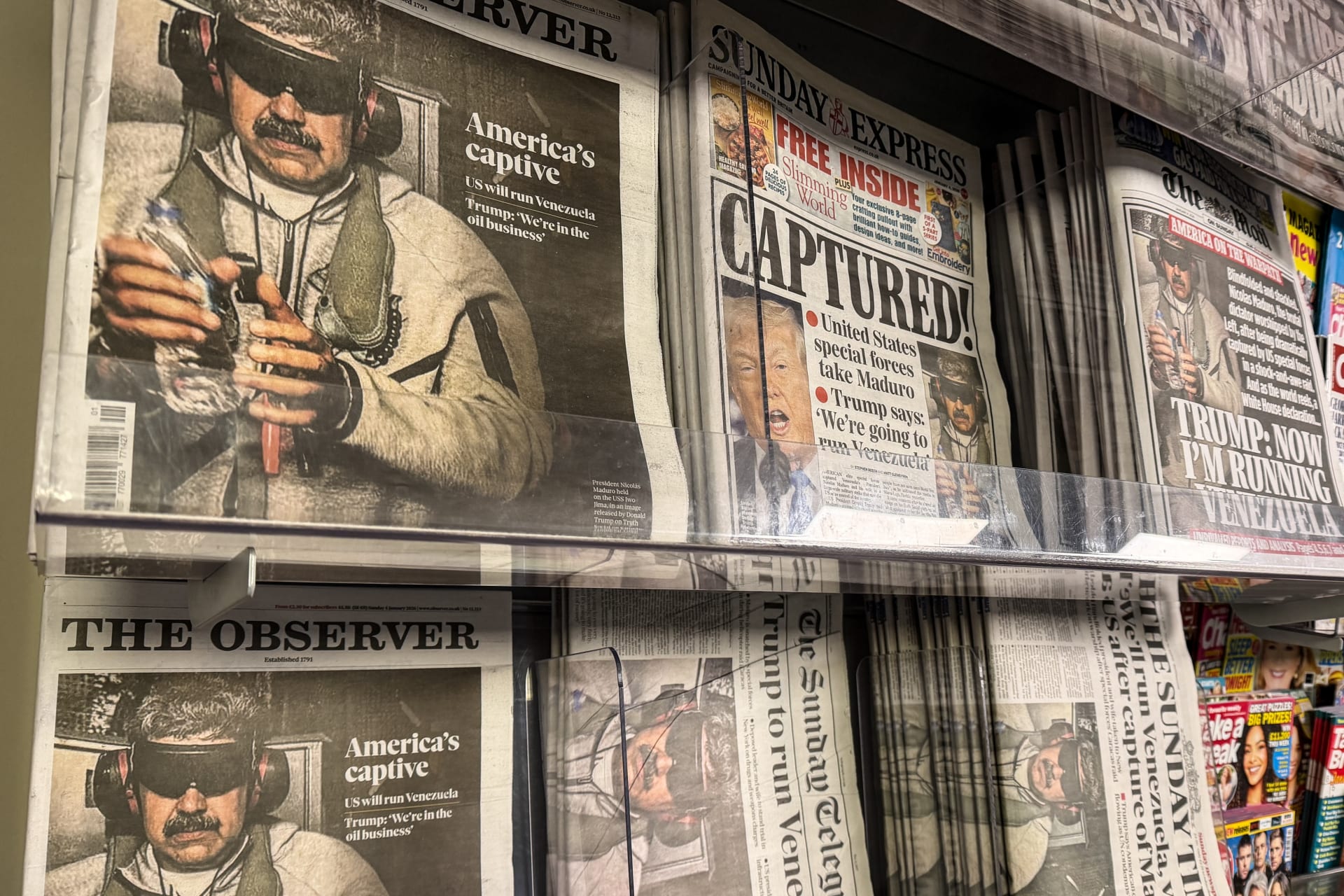 Newsstand with of newspapers featuring arrest of Nicolas Maduro