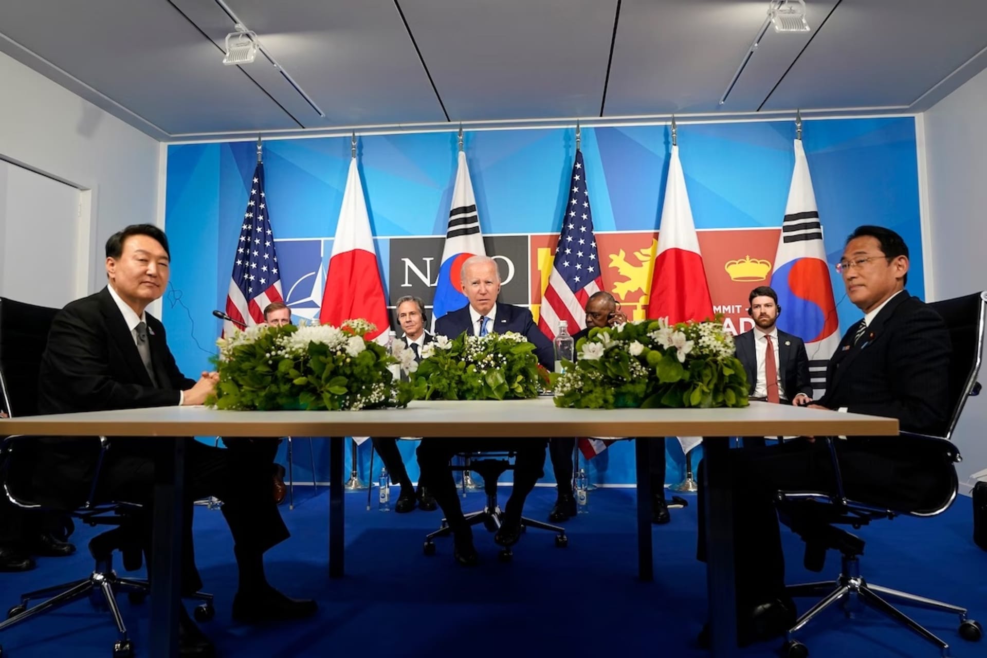 <p>President Biden meets with South Korean President Yoon Suk Yeol, left, and Japanese Prime Minister Fumio Kishida during the NATO summit in Madrid on June 29, 2022.</p>
