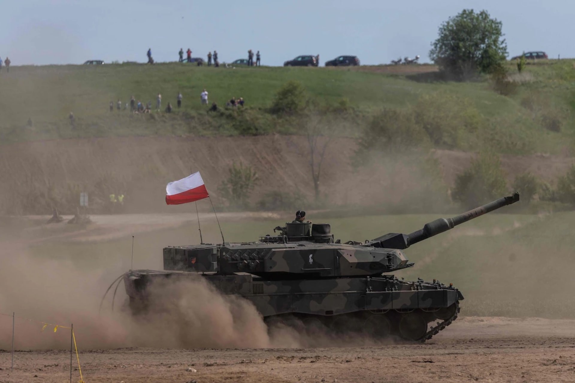 <p>A Polish Leopard tank is seen as troops from Poland, the United States, France and Sweden take part in a military exercise in Nowogrod, Poland, on May 19, 2022. </p>
