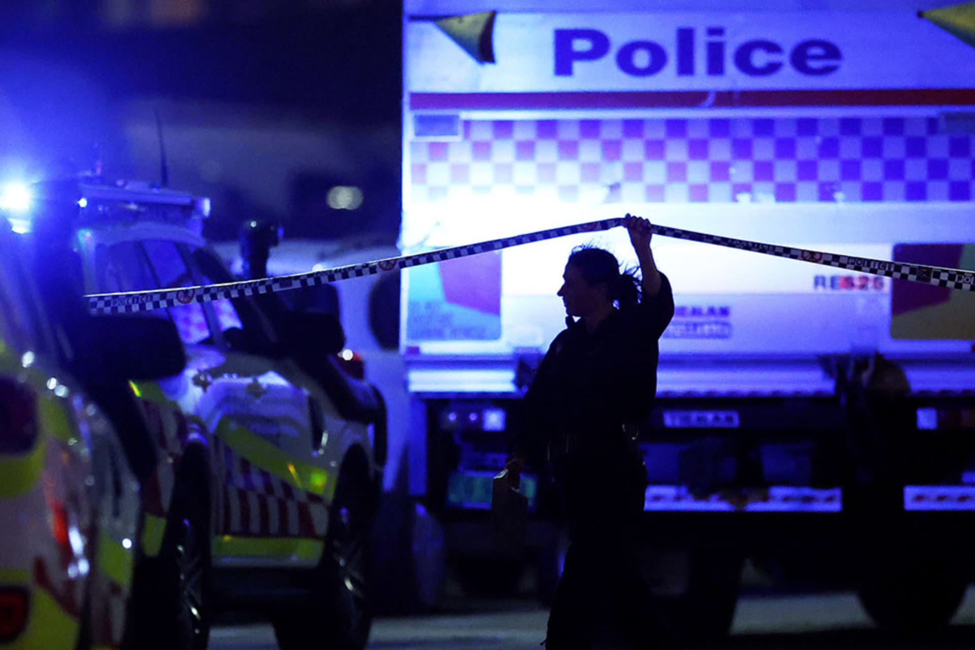 <p>A police officer walks along cordon tapeline at the scene of a mass shooting at Bondi Beach in Sydney, Australia on December 14, 2025.</p>
