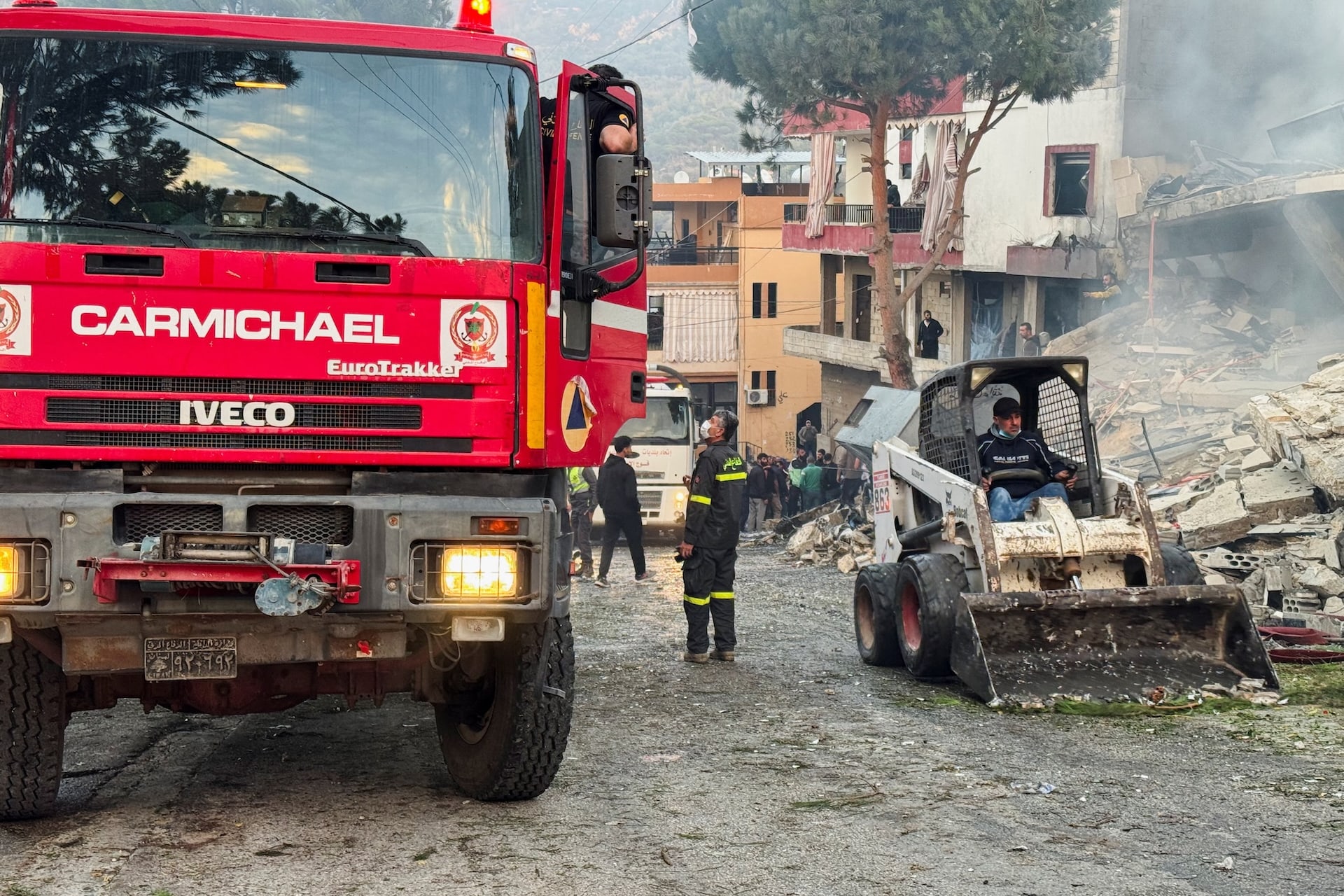 <p>A man operates a machinery as he clears a street from rubble, after Israel’s military said it struck targets in two southern Lebanese towns on Thursday, in Jbaa southern Lebanon, December 4, 2025. </p>